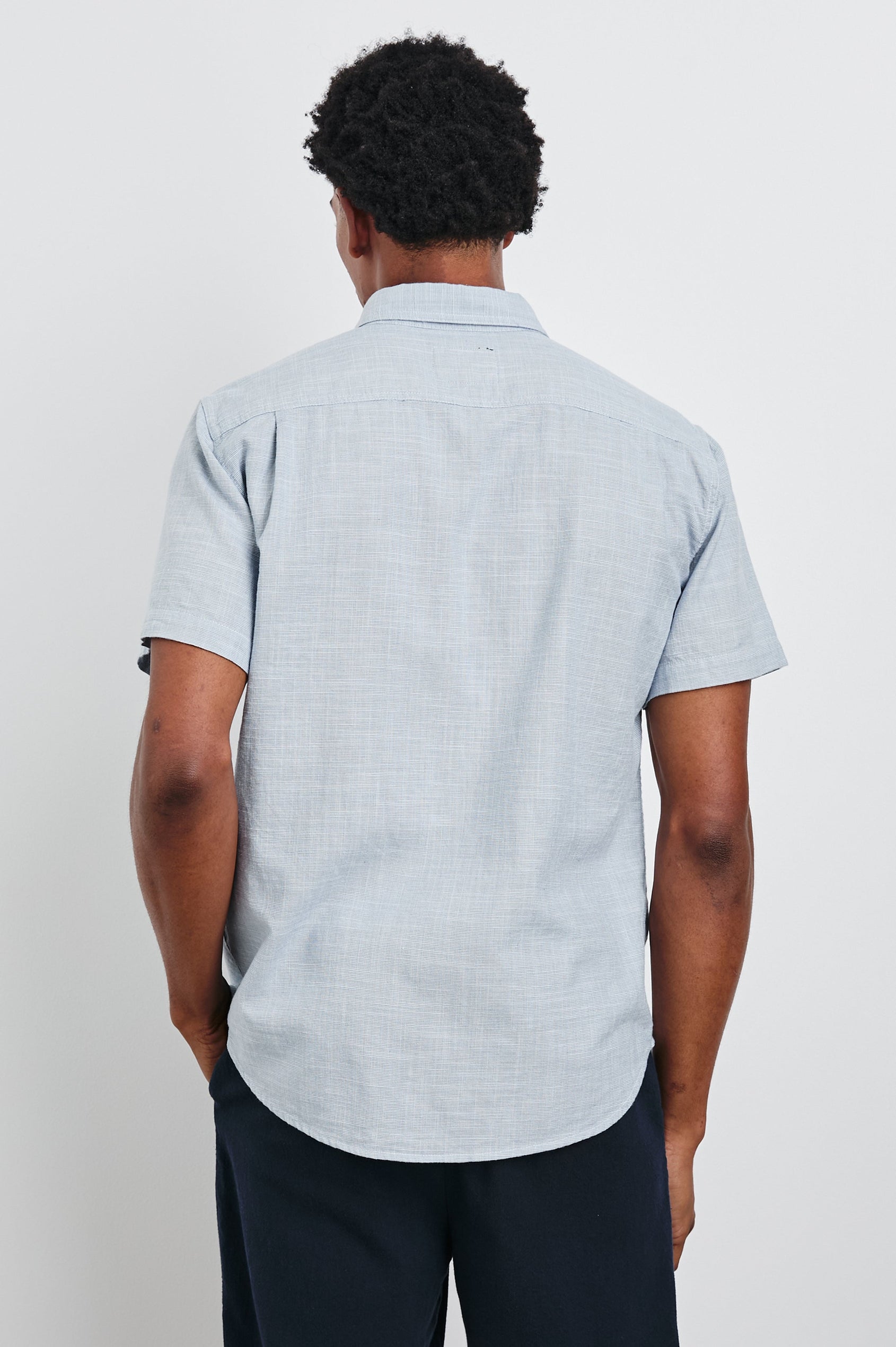 Fairfax Short-Sleeve Button Up with a Chest Patch Pocket in Tidal Etch Colorway - Back View Featured on Model
