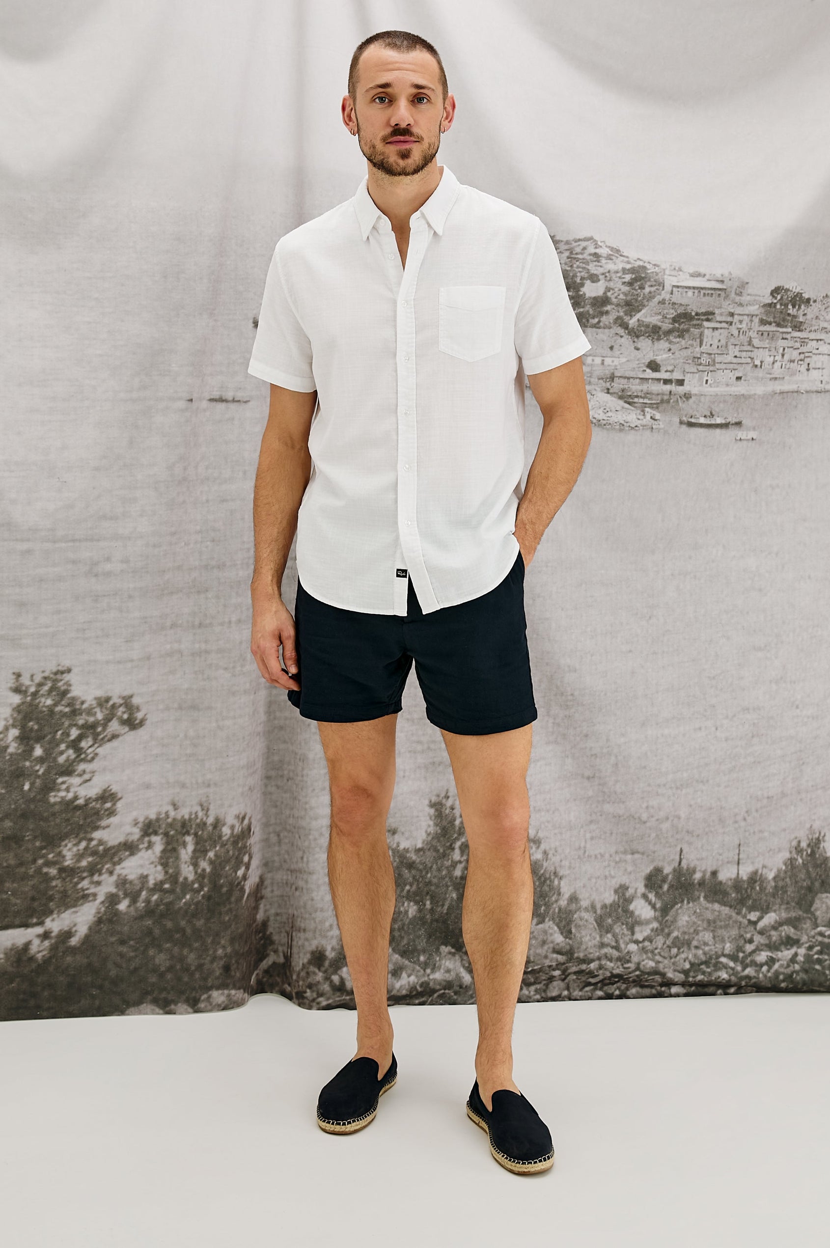 Fairfax short sleeve button up shirt with collar and chest pocket in White - full body front view on model.