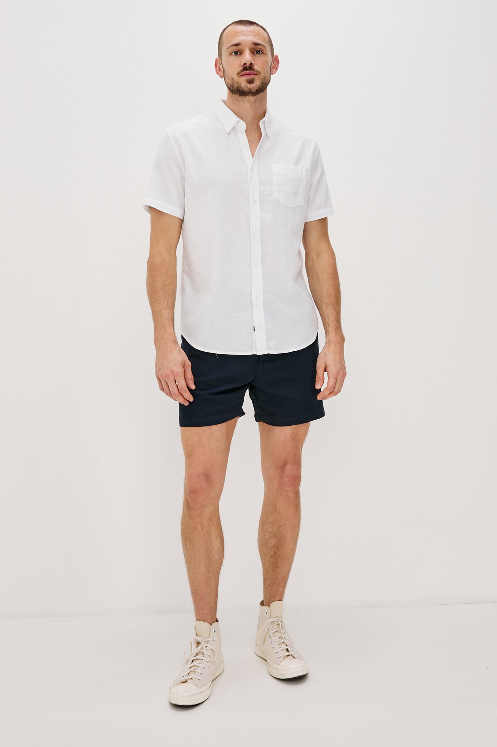 Fairfax short sleeve button up shirt with collar and chest pocket in White - full body front view on model
