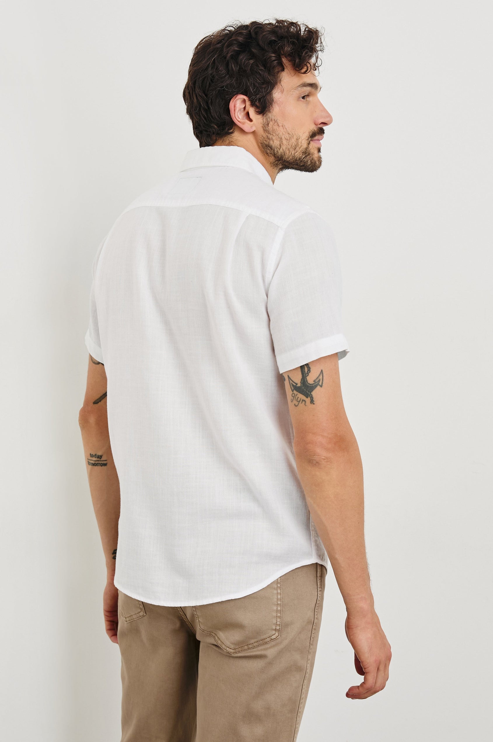 Fairfax short sleeve button up shirt with collar and chest pocket in White - back view on model
