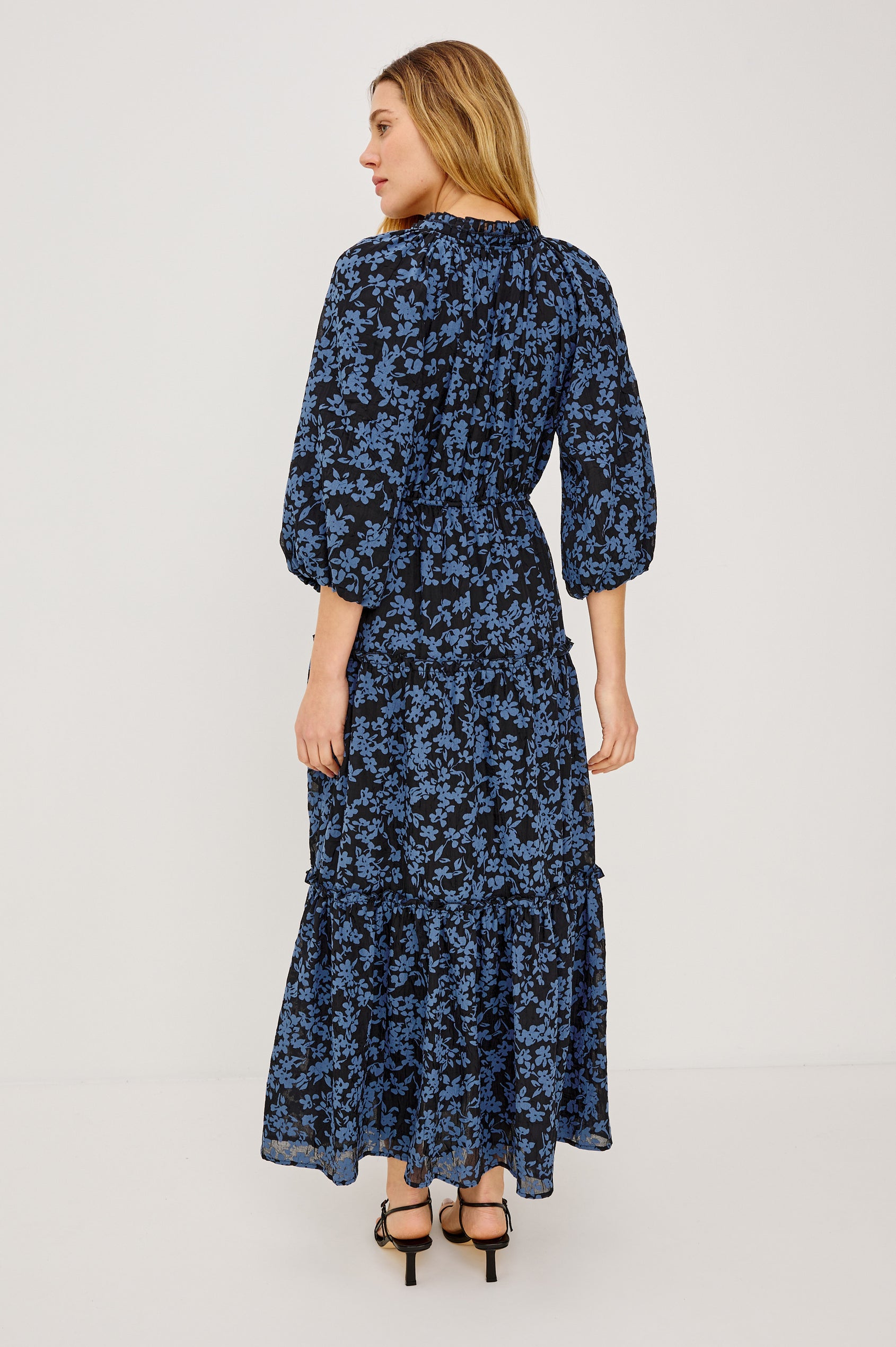 Felicia Maxi Dress in Crinkle Clip Jacquard With Split V-Neck With Self-Ties, Gathered Sleeves, Elastic Waist, and Loose Fit in Midnight Silhouette Floral Colorway - Full Body Back View Featured on Model