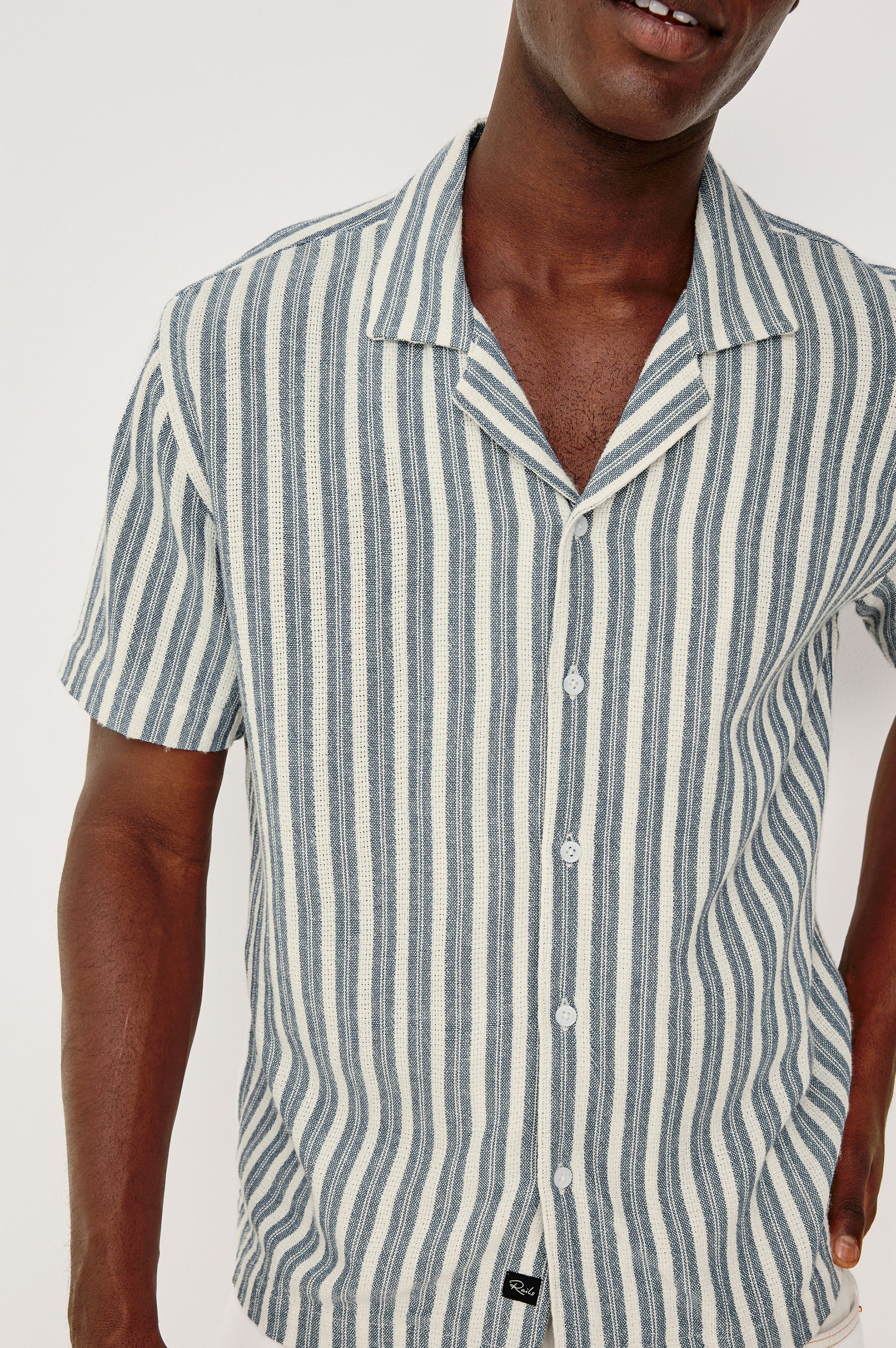Fielder Button Front Shirt With Short Sleeves and Relaxed Boxy Fit in Marine White Stripe Colorway - Upper Body Front Close Up View Featured on Model