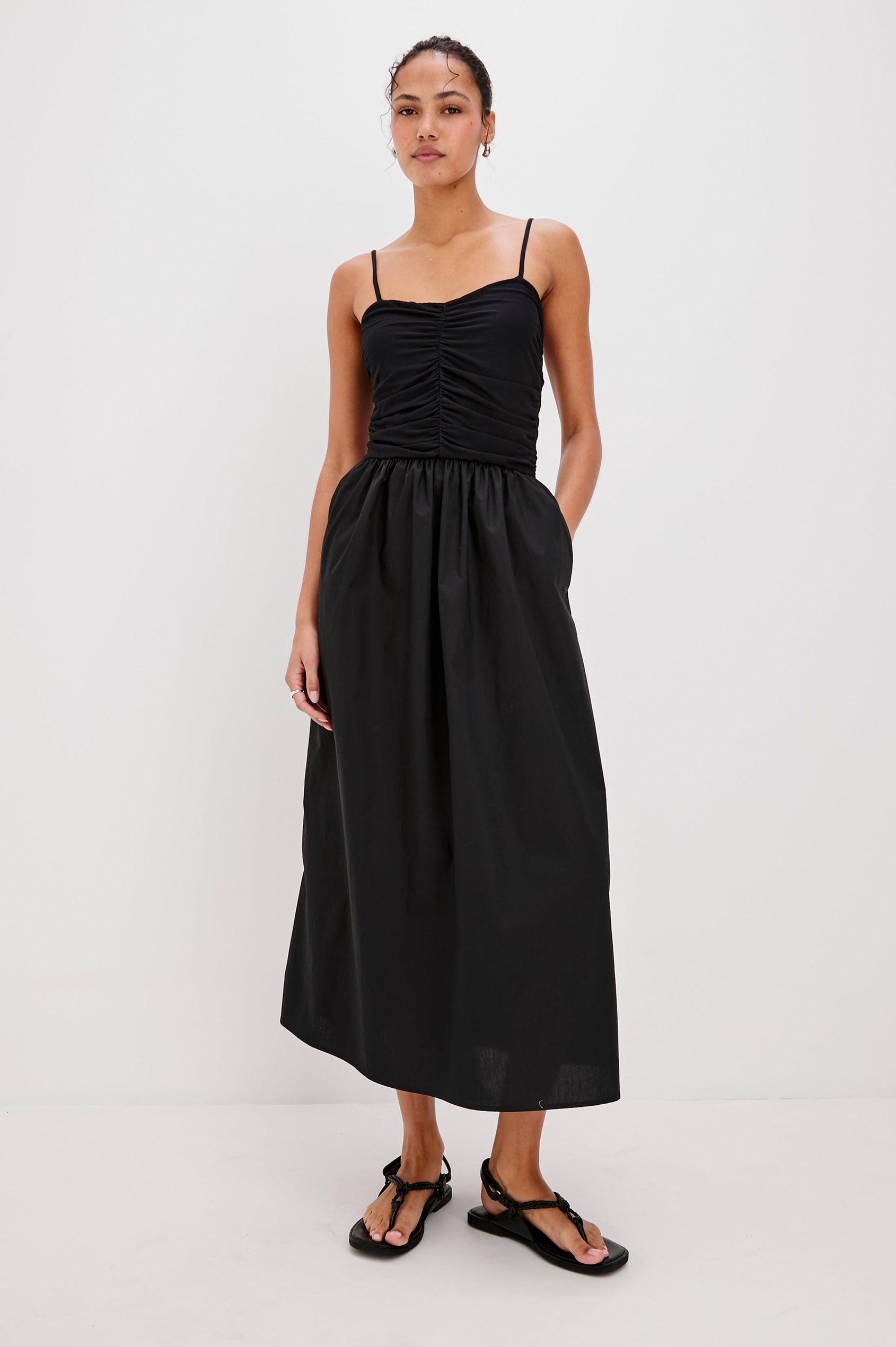 Fisher Midi Tank Dress with Spaghetti Straps, Gathered Center Front Detail on Bodice and a Gathered Waistband in Black Colorway. Front View Shown on Model.