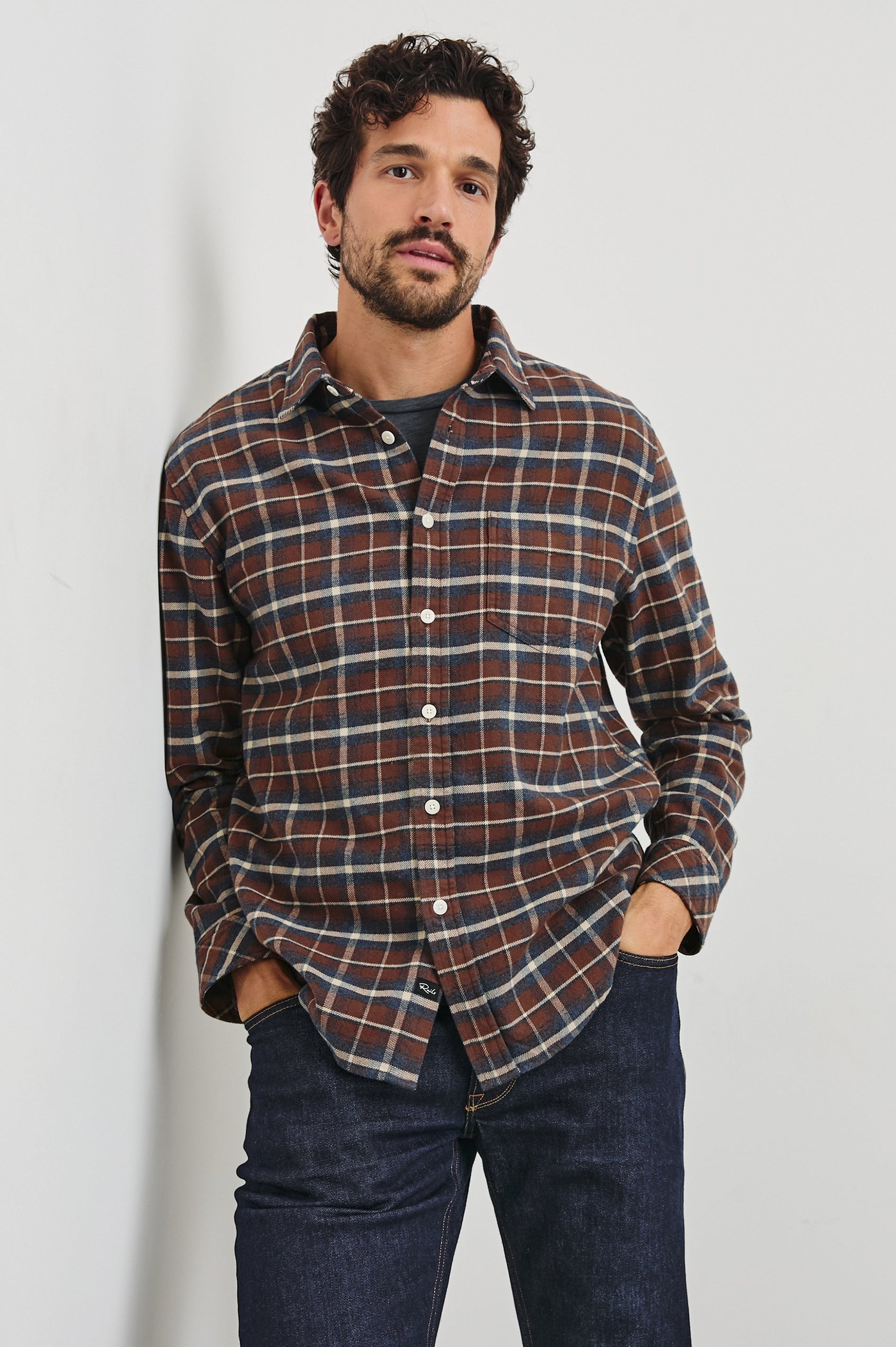 Forrest Long-Sleeve Button Up with a Chest Patch Pocket in Hickory Blue Melange Colorway, a Brown, Blue and White plaid - Front View Featured on Model