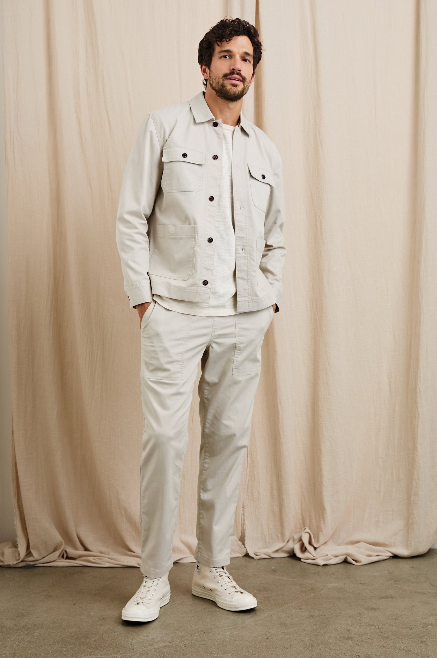 Franklin Jacket with Button Closure, Two Front Patch Pockets and Two Chest Button Flap Pockets in Oat Railroad Dobby Colorway - Front Full Body View Featured on Model