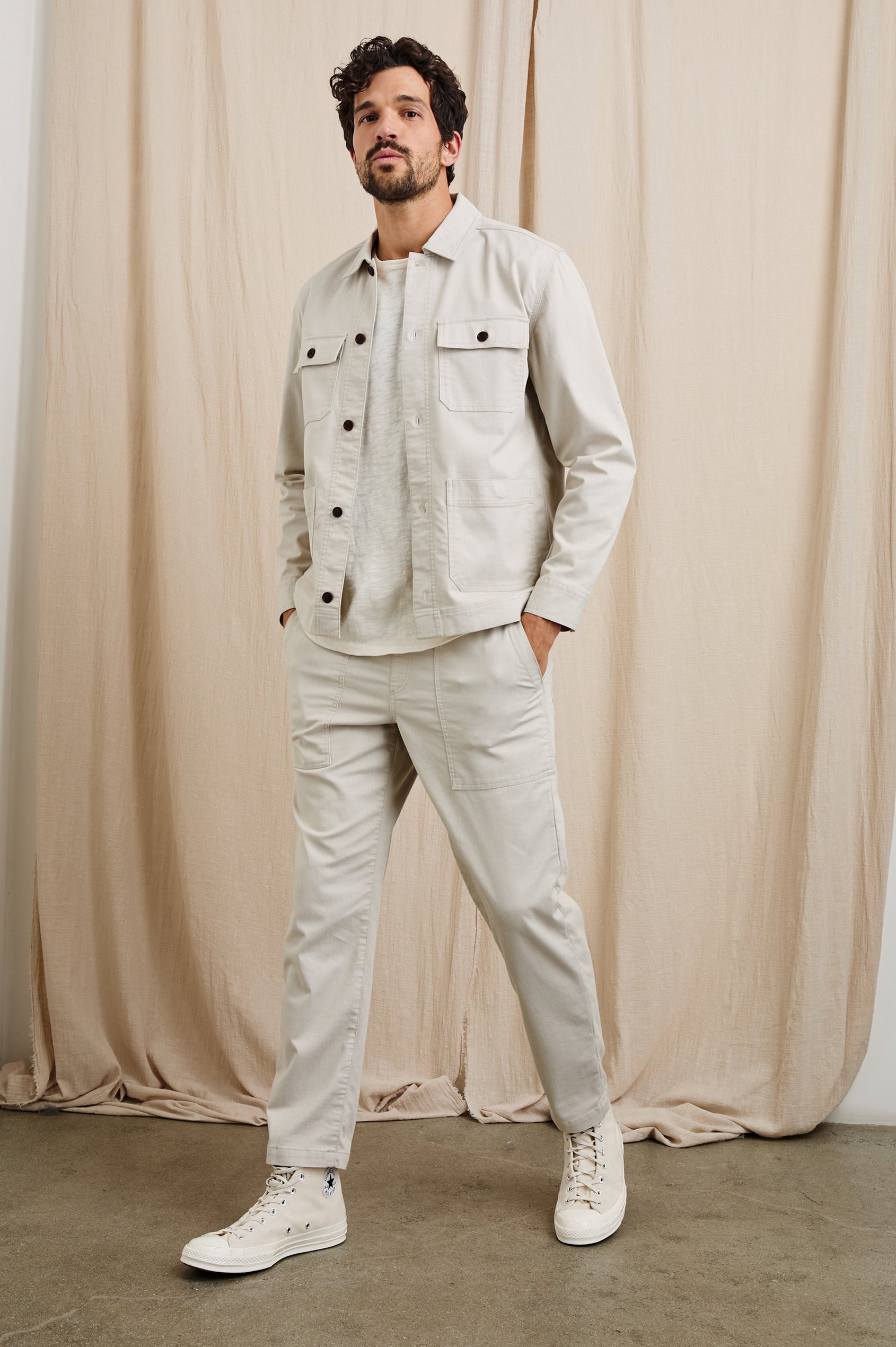 Franklin Jacket with Button Closure, Two Front Patch Pockets and Two Chest Button Flap Pockets in Oat Railroad Dobby Colorway - Front Full Body View Featured on Model