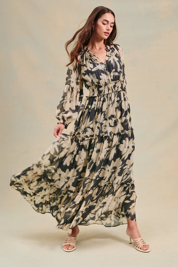 Frederica long sleeve flowy maxi dress with smocked neckline and waist and tiered skirt in Charcoal Lily - stylized front view on model