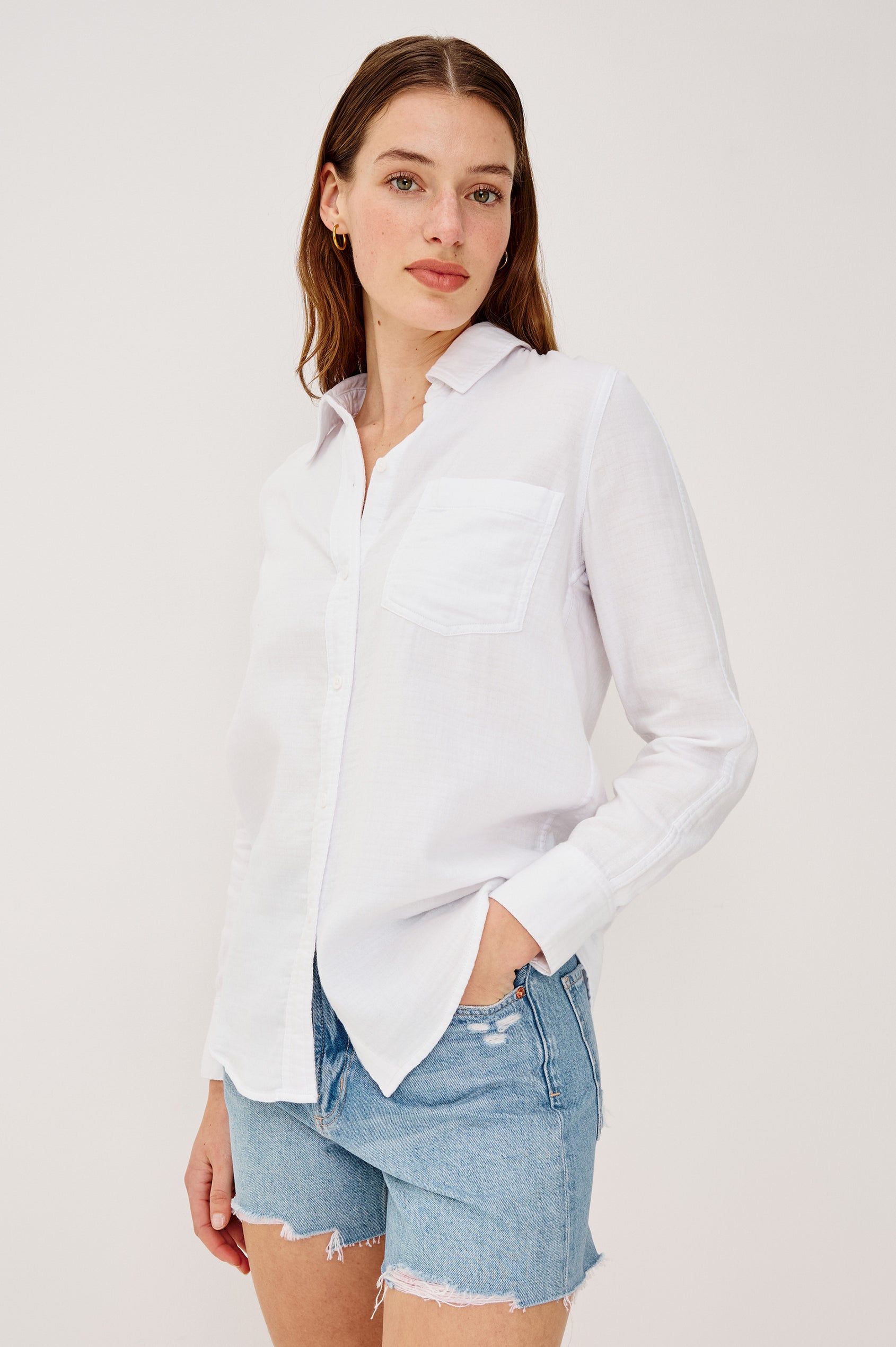 Freeman Button-Up Collared Shirt With Subtle Herringbone Texture Relaxed FIt Chest Patch Pockets and Long Sleeves in White Colorway - Upper Body Front View Featured on Model
