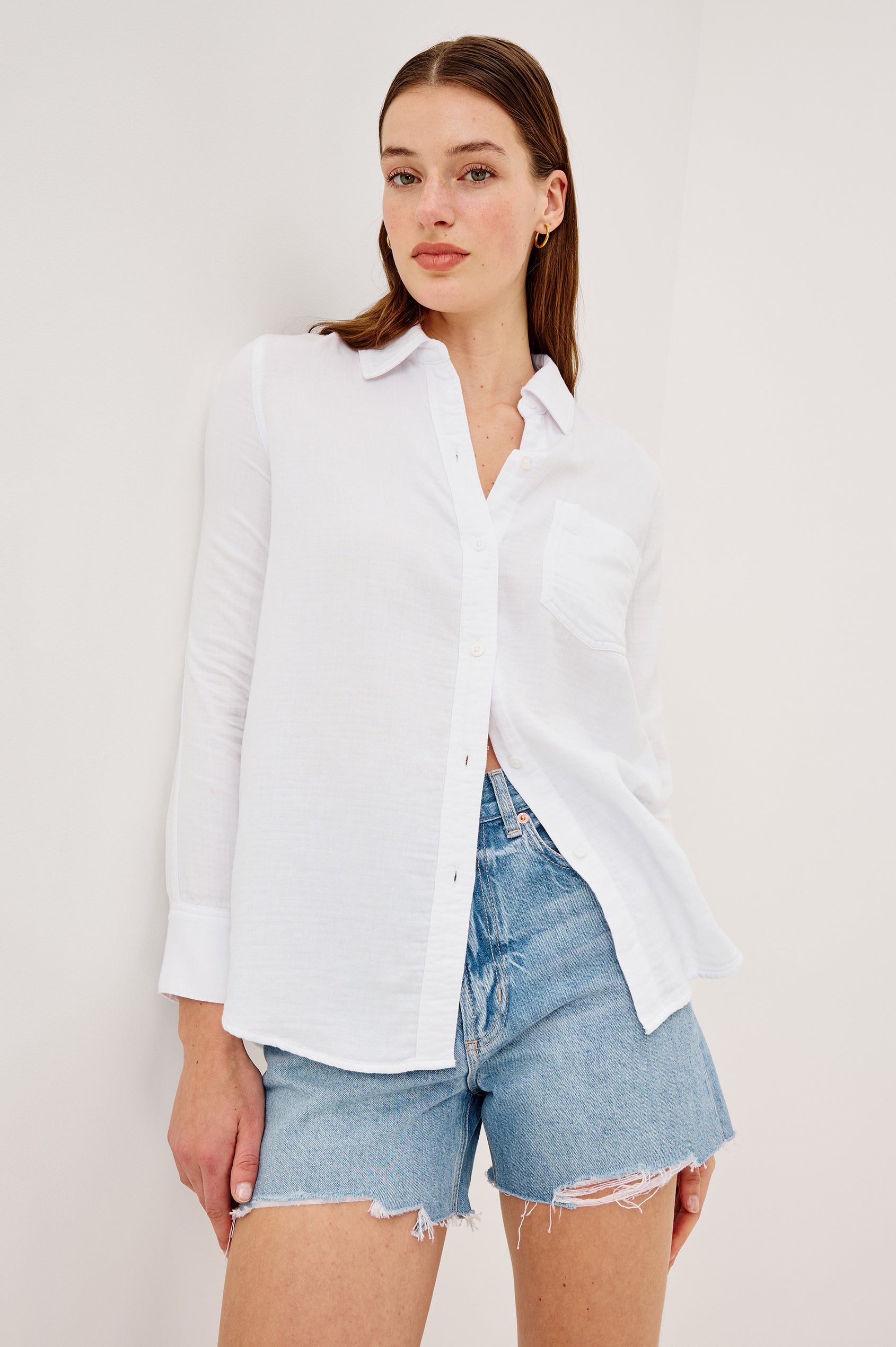Freeman Button-Up Collared Shirt With Subtle Herringbone Texture Relaxed FIt Chest Patch Pockets and Long Sleeves in White Colorway - Upper Body Front View Featured on Model