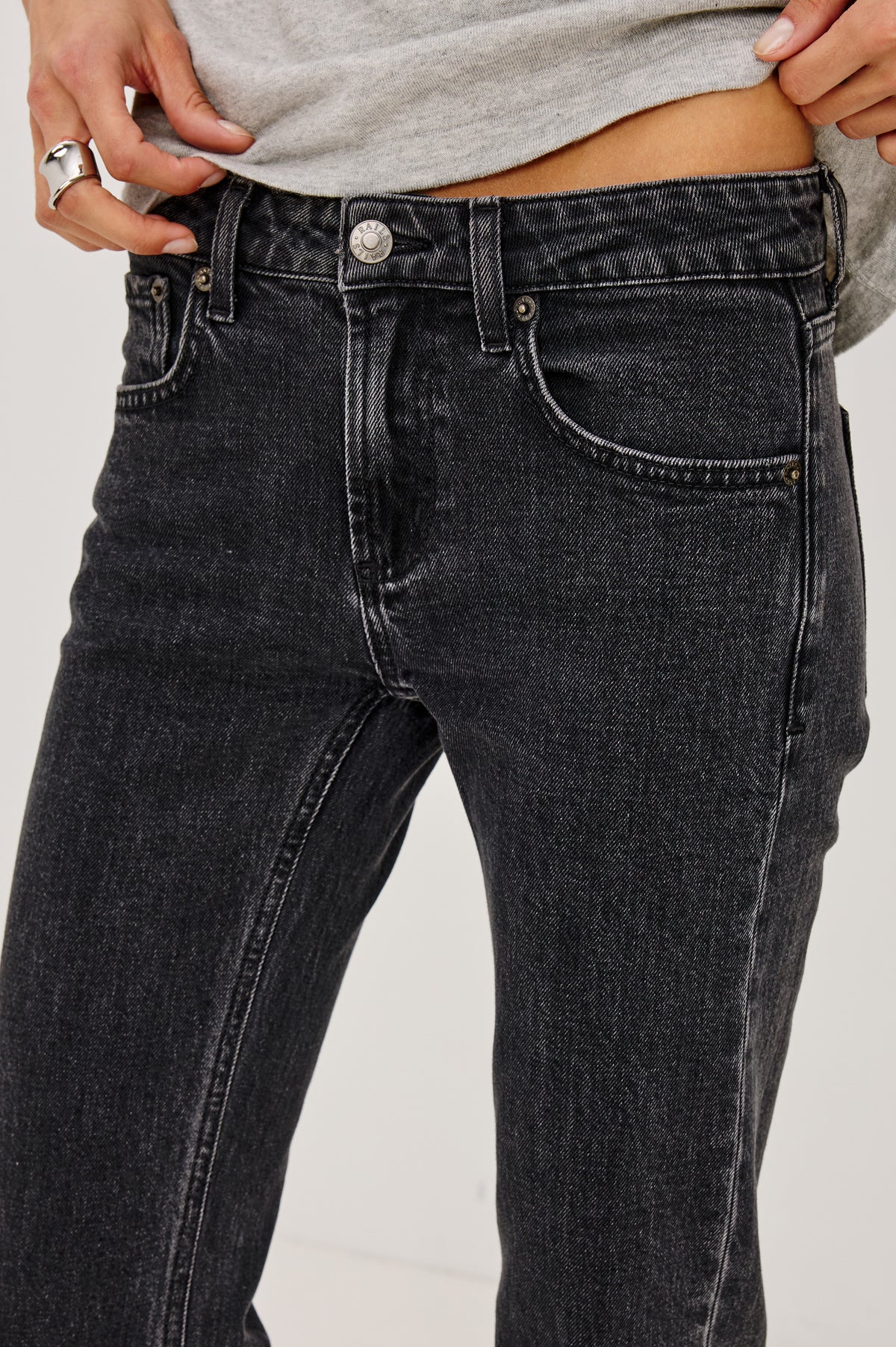 Fremont Low Rise Bootcut Jean in Light Stretch Denim With Extended Inseam, 5-Pockets, Belt Loops, and Zip-Fly Closure in Blackjack Colorway - Lower Body Front View Featured on Model