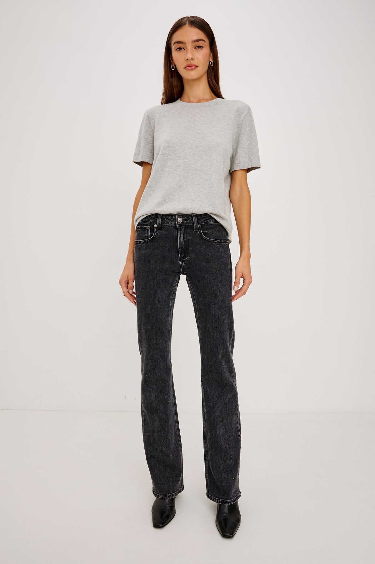 Fremont Low Rise Bootcut Jean in Light Stretch Denim With Extended Inseam, 5-Pockets, Belt Loops, and Zip-Fly Closure in Blackjack Colorway - Full Body Front View Featured on Model