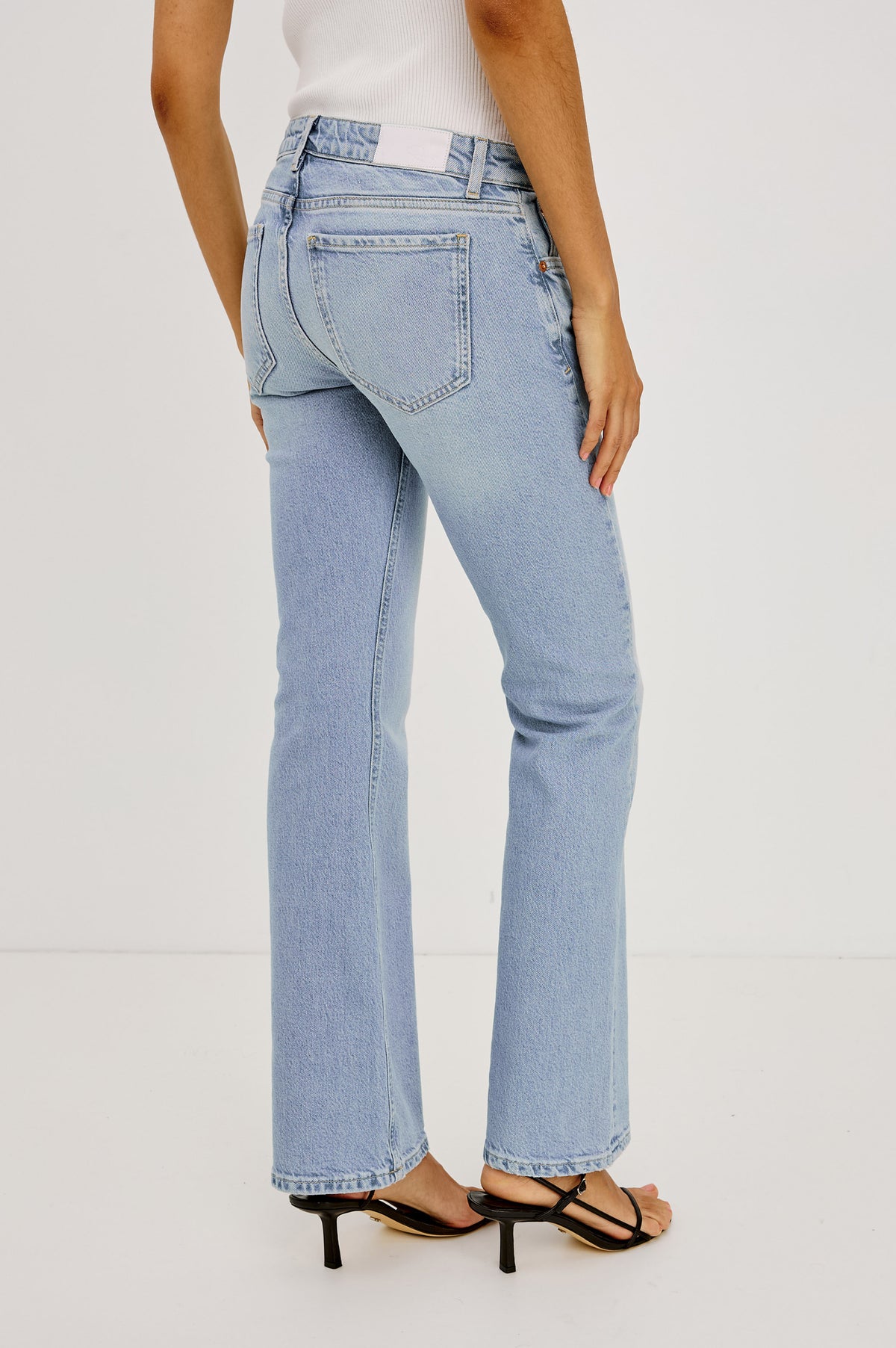 Fremont Bootcut Jean in Comfort Stretch Denim With 5-Pockets and Front Zip Fly in Jasper Colorway - Lower Body Back View Featured on Model