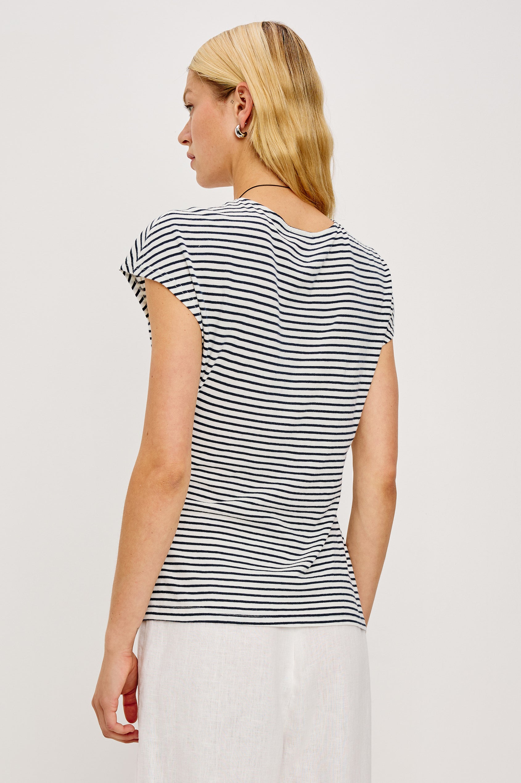 Gabbie Top in Cotton With Boat Neckline Dolman Cap Sleeves and Waist Wrap Ties in Ivory Navy Micro Stripe Colorway - Upper Body Back View Featured on Model