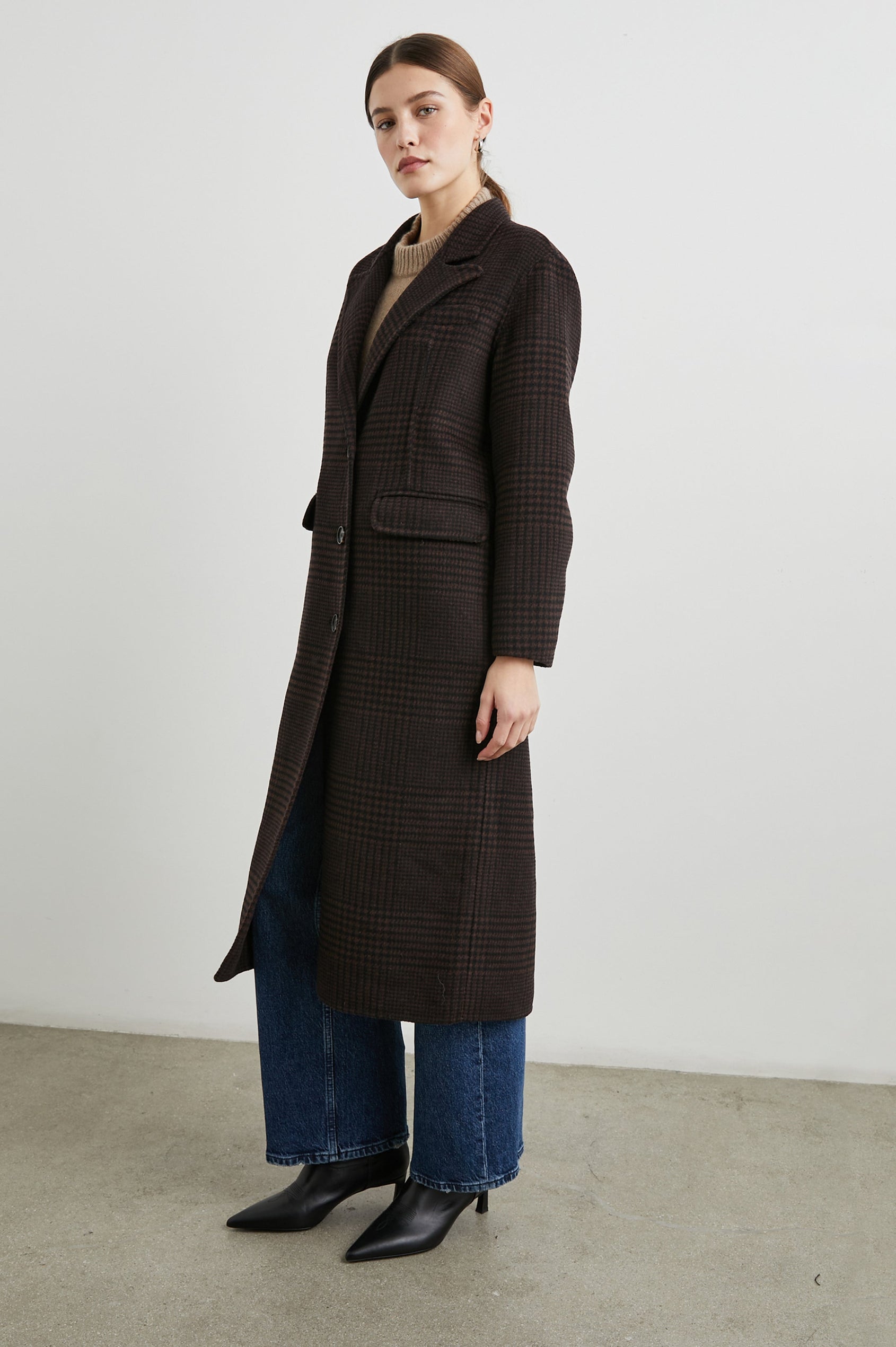 Gallery Below-the-Knee Coat with Three-Button Closure, Notched Lapels, and Two Front Flap Pockets in Espresso Houndstooth Colorway - Front Full Body View Featured on Model