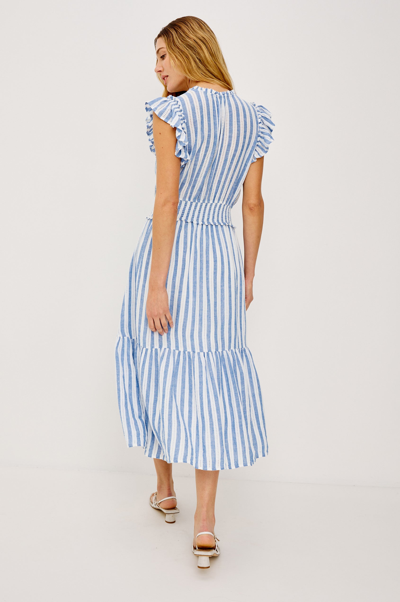 Garden Peasant Midi Dress in Linen With Ruffle Flutter Sleeves, Center Front Ties, V-Neckline, Shirred Waist, and Relaxed Fit in Atlantis Stripe Colorway - Full Body Back View Featured on Model