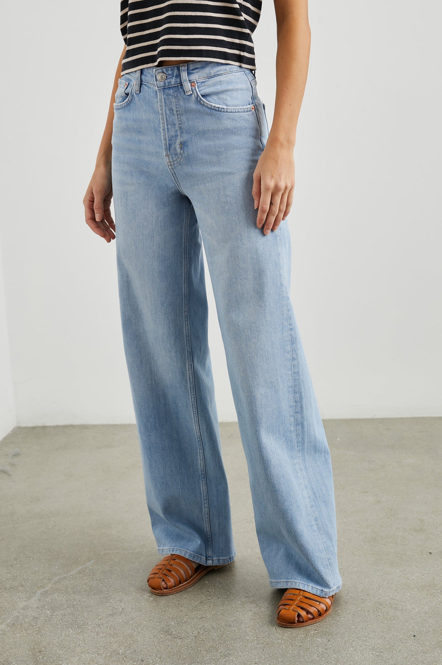 Getty Wide Leg Denim Pants with Belt Loops, Two Front Pockets and Two Back Patch Pockets in Blue Mist Colorway - Front View Featured on Model