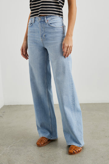Getty Wide Leg Denim Pants with Belt Loops, Two Front Pockets and Two Back Patch Pockets in Blue Mist Colorway - Front View Featured on Model