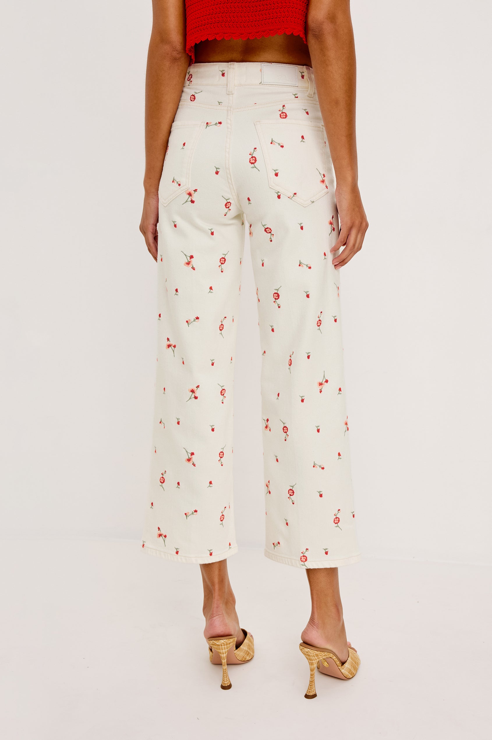 Getty Crop Jean in Light Stretch Denim With Wide Straight Legs, 27″ Inseam, Floral Embroidery, 5-Pockets, and Zip Fly in Ecru Romantic Floral Colorway - Lower Body Back View Featured on Model