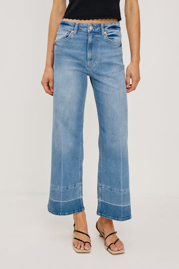 Getty crop isa a 5-pkt wide leg jean in Independence colorway, a medium wash with a released hem - front view featured on model.