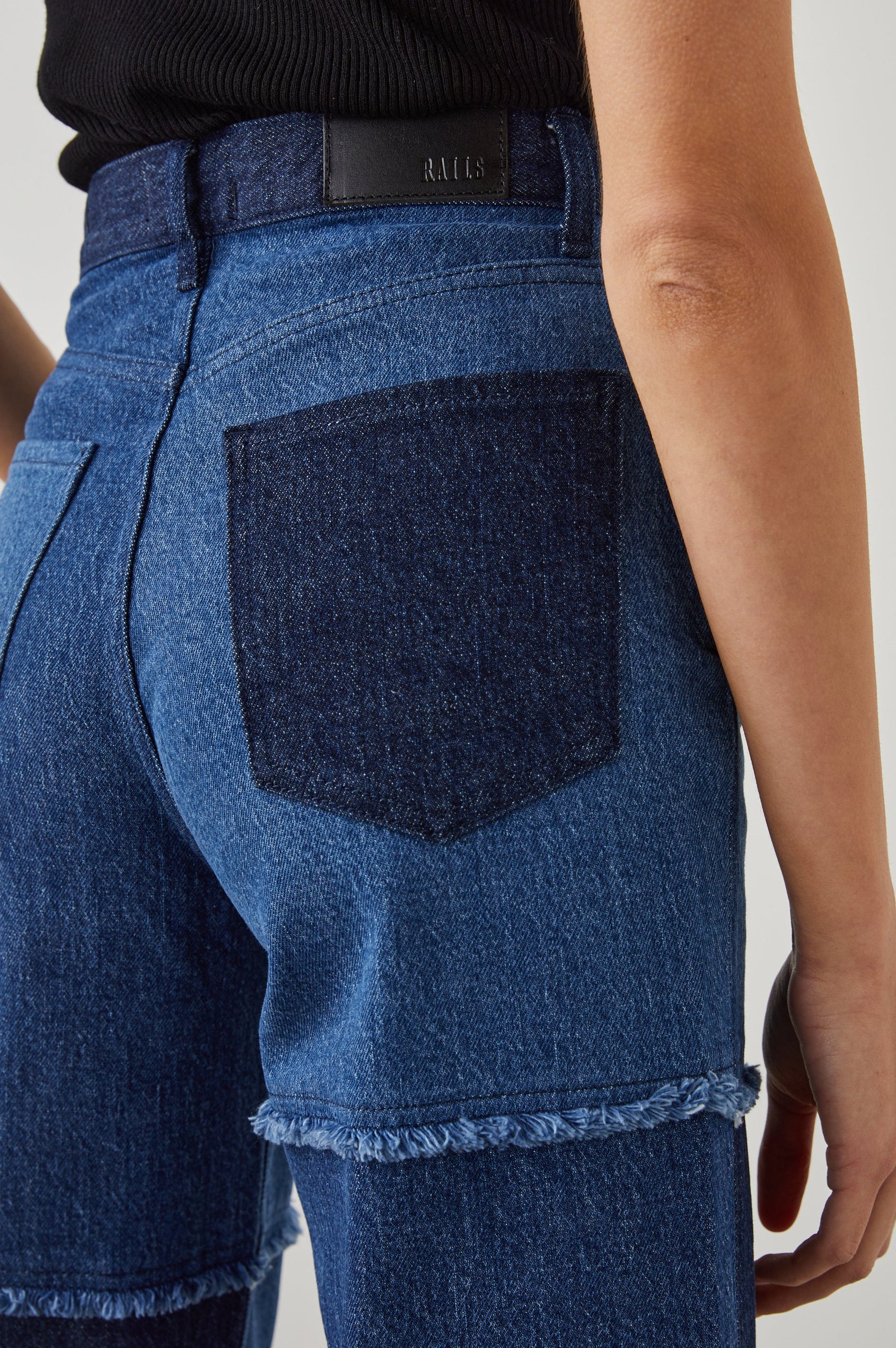 Getty Crop Wide Leg Denim Pants with Belt Loops, Two Front Pockets and Two Back Patch Pockets in Indigo Patchwork Colorway, with large patches in blues - Back View Featured on Model