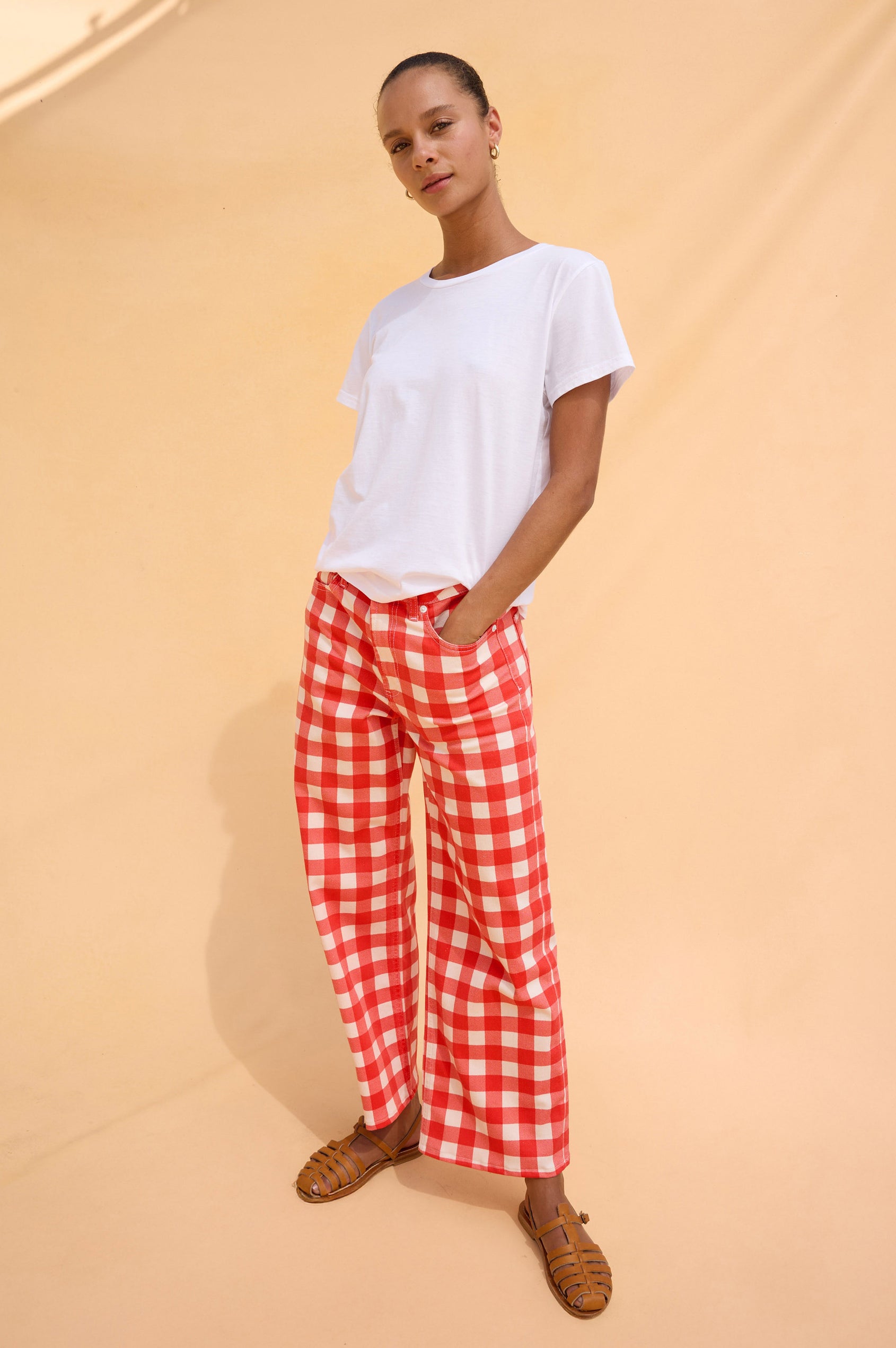 Getty Crop Wide Straight Leg Jean in High Stretch Cotton Denim With High Pinched Waist, 27″ Inseam, Zip Fly, and 5-Pockets in Tomato Gingham Colorway - Lower Body Front View Featured on Model