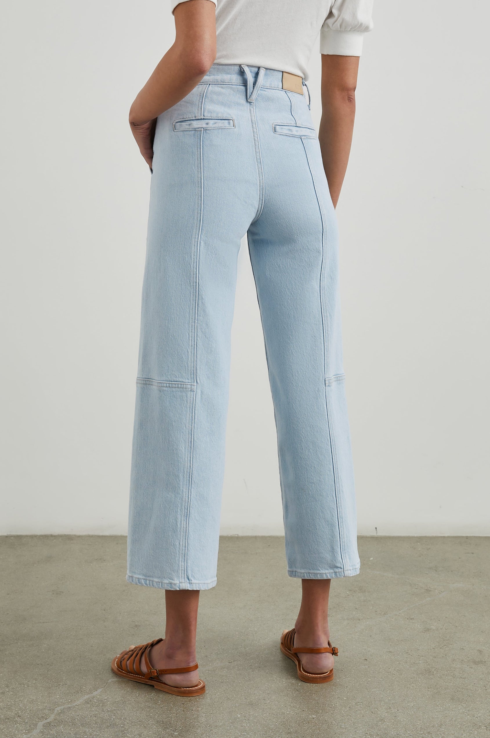 Getty Crop Utility Wide Leg Denim Pants with Belt Loops, Additional Seams, Two large Front Pockets and Two Back Patch Pockets in Oceanview Colorway - Back View Featured on Model