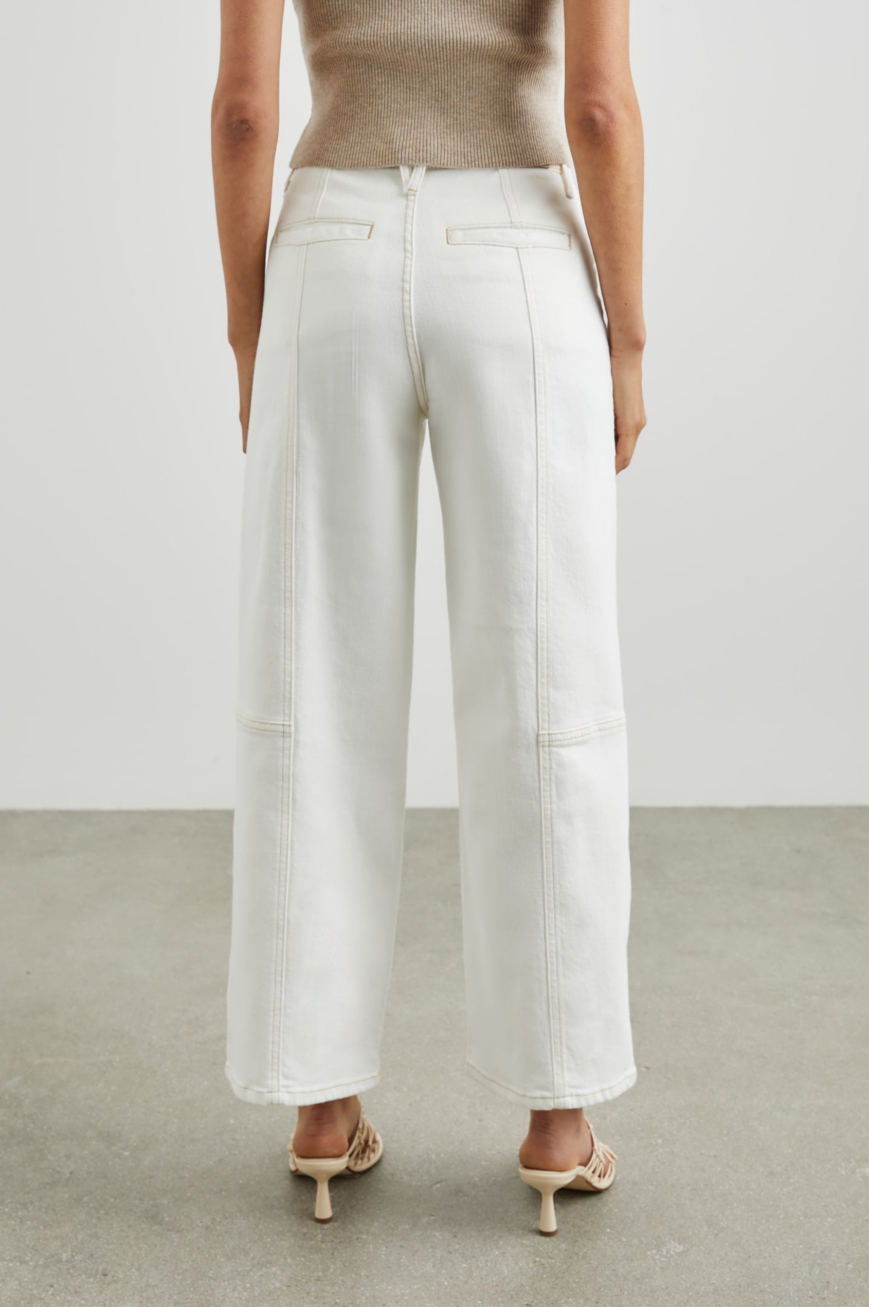 Getty Crop Utility Wide Leg Denim Pants with Belt Loops, Additional Seams, Two large Front Pockets and Two Back Patch Pockets in Vintage Ecru Contrast Stitch Colorway, gold-toned Seam Stitching - Back View Featured on Model