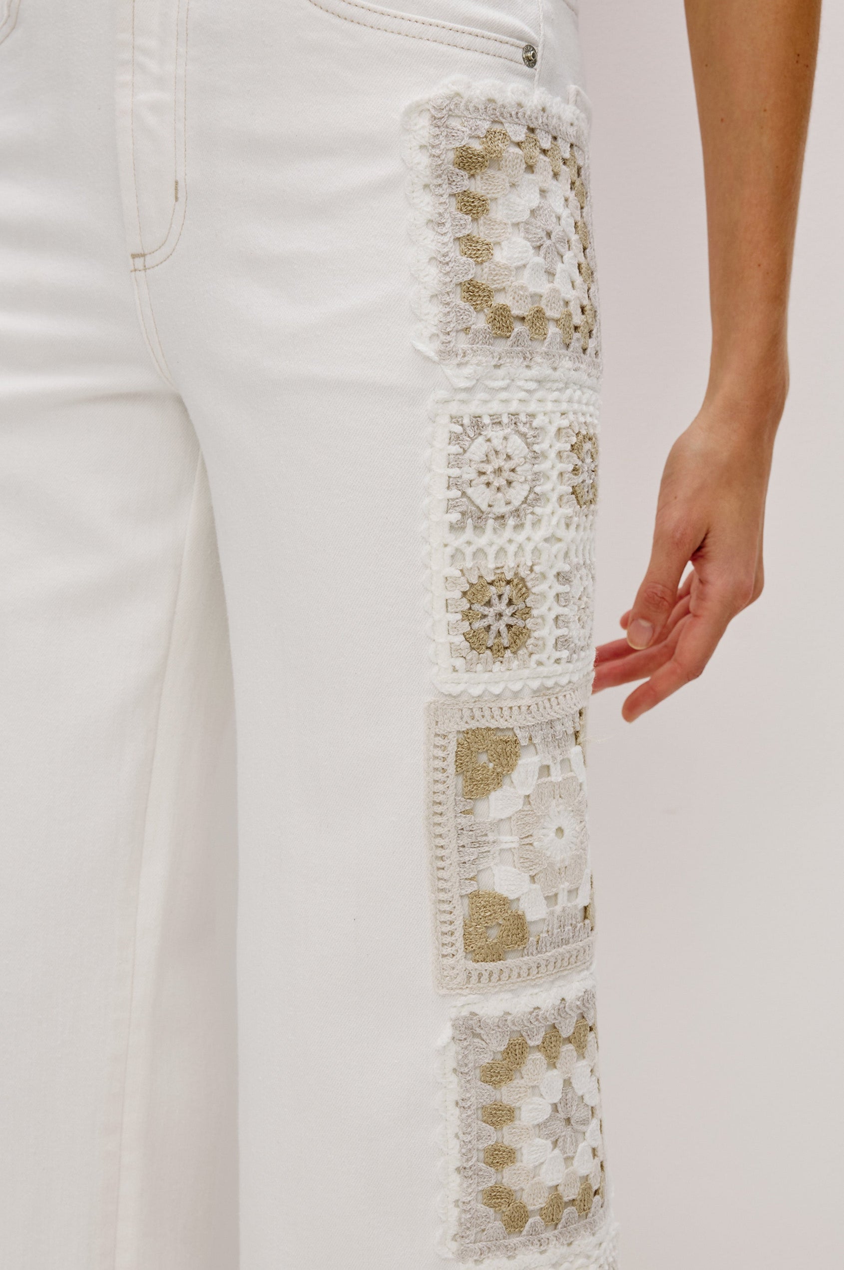 Getty Crop 5-Pocket Denim Pant with Tonal Crochet Side Seam Panels, Traditional Zip and Button Fly and Belt Loops in Vintage Ecru Crochet Colorway. Front Detail View Shown on Model.