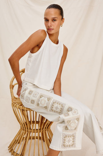 Getty Crop 5-Pocket Denim Pant with Tonal Crochet Side Seam Panels, Traditional Zip and Button Fly and Belt Loops in Vintage Ecru Crochet Colorway. Full Body Front View Shown on Model.