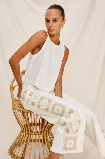 Getty Crop 5-Pocket Denim Pant with Tonal Crochet Side Seam Panels, Traditional Zip and Button Fly and Belt Loops in Vintage Ecru Crochet Colorway. Full Body Front View Shown on Model.