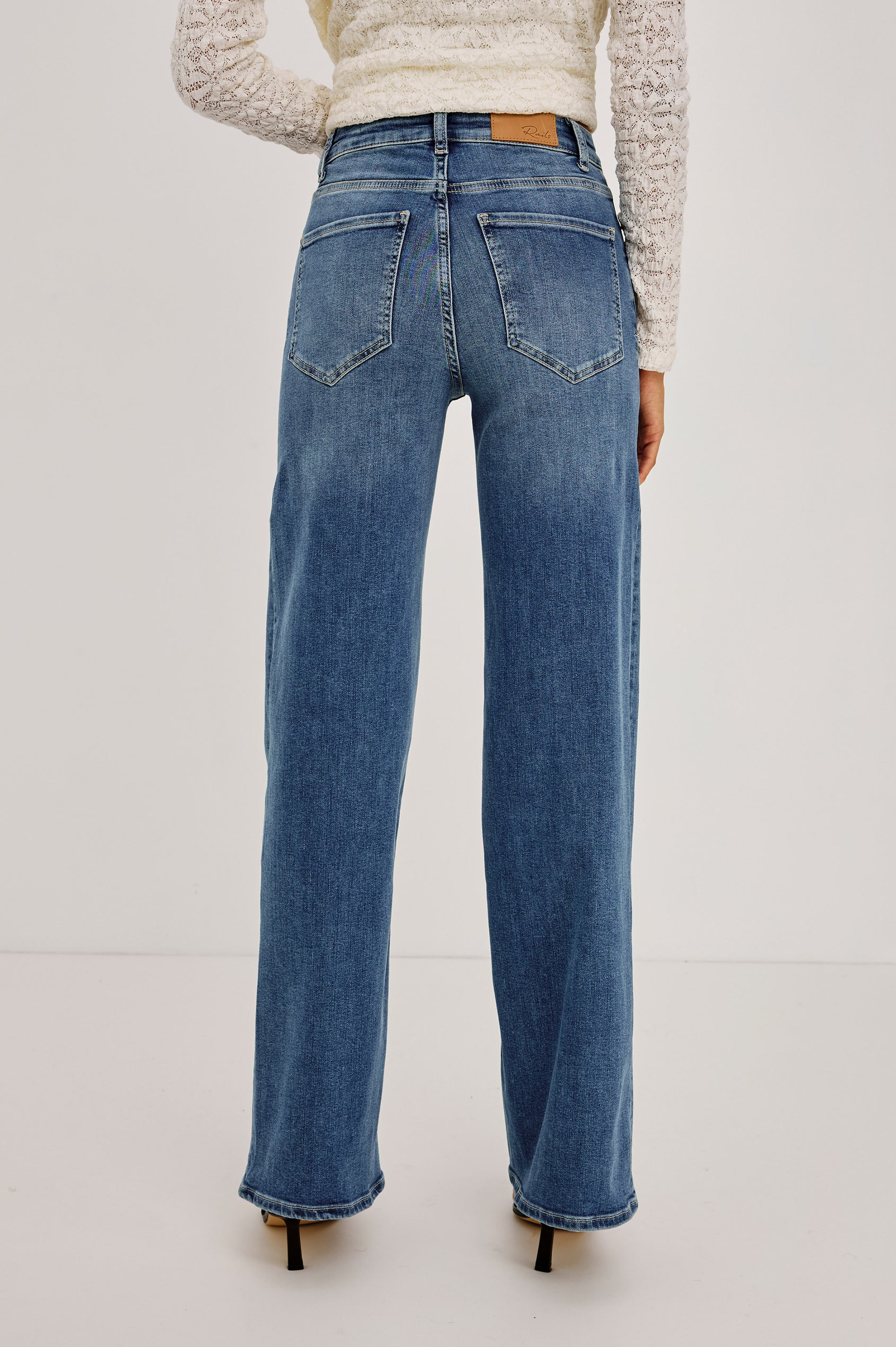Getty Wide Leg Denim Pants with Belt Loops, Two Front Pockets and Two Back Patch Pockets in East Coast Colorway - Back View Featured on Model
