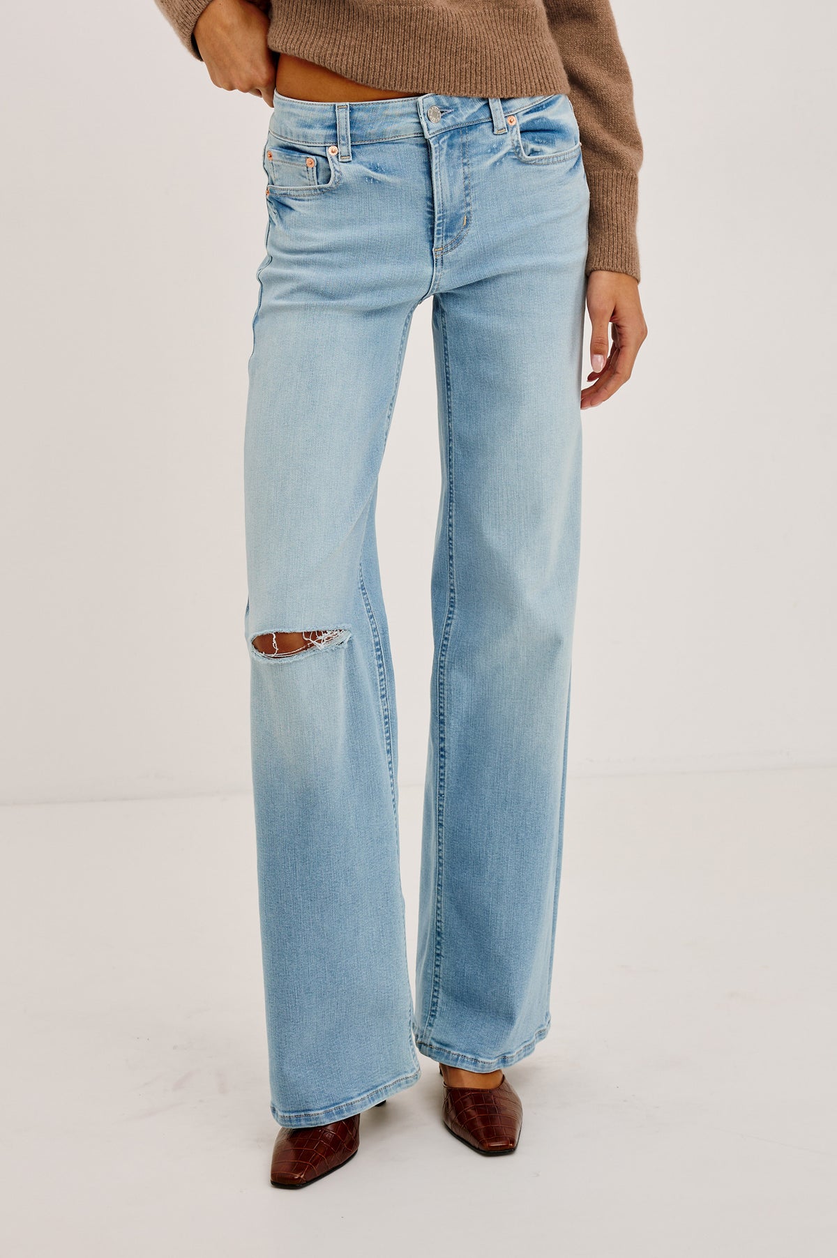 Getty Low Rise Wide Leg Jean in Comfort-stretch Denim With 5-Pockets in Wave Rider Colorway - Lower Body Front View Featured on Model