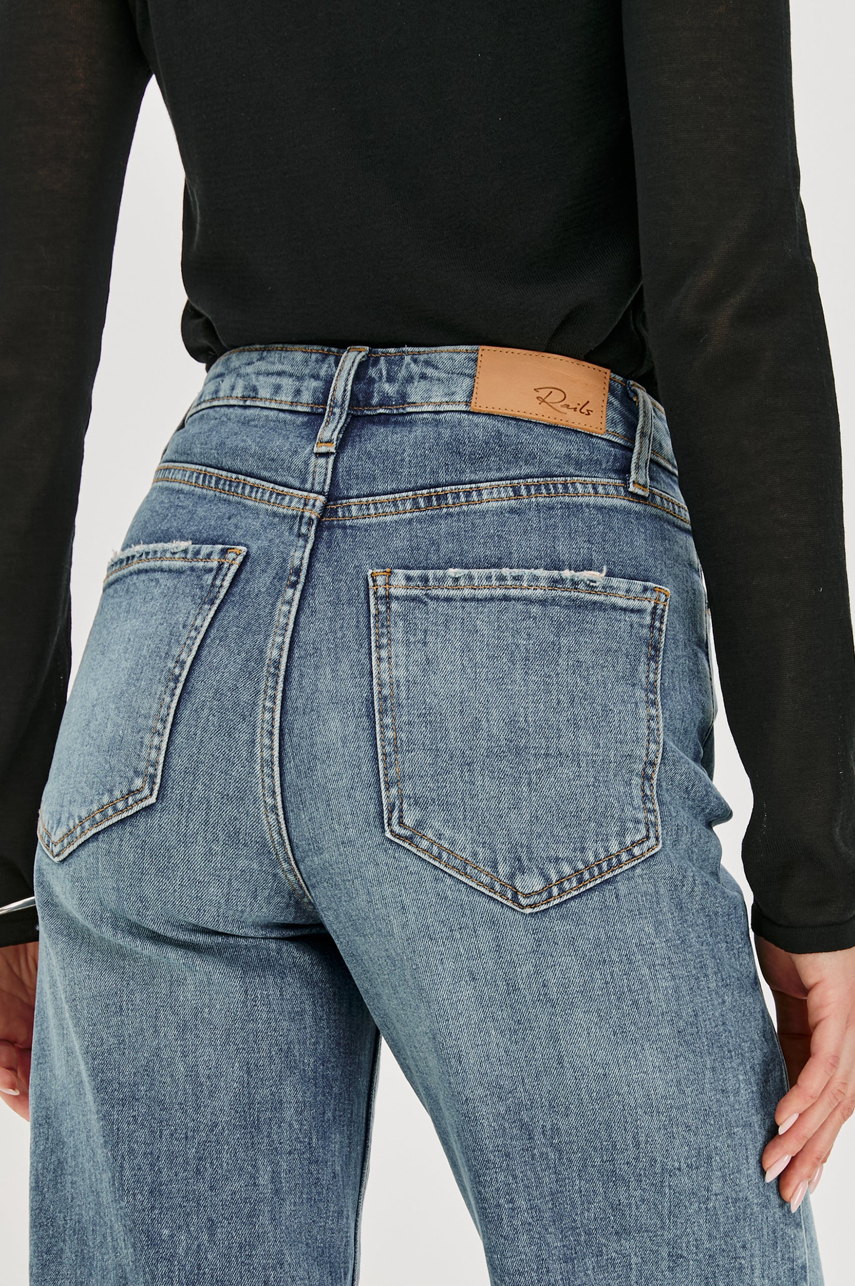 Getty full length 5-pocket wide leg jean in Tradewind colorway, a medium wash. Back detail view featured on model.