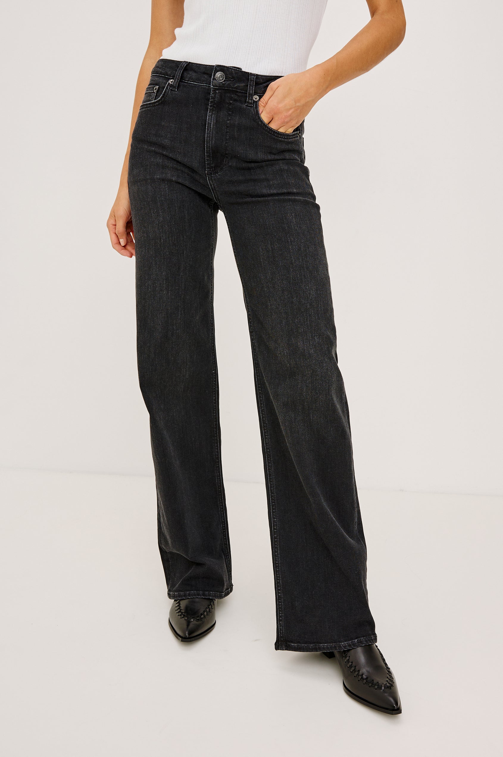 Getty Wide Leg Jean in Light Stretch Denim With 5-Pockets in Vintage Black Colorway - Lower Body Front View Featured on Model
