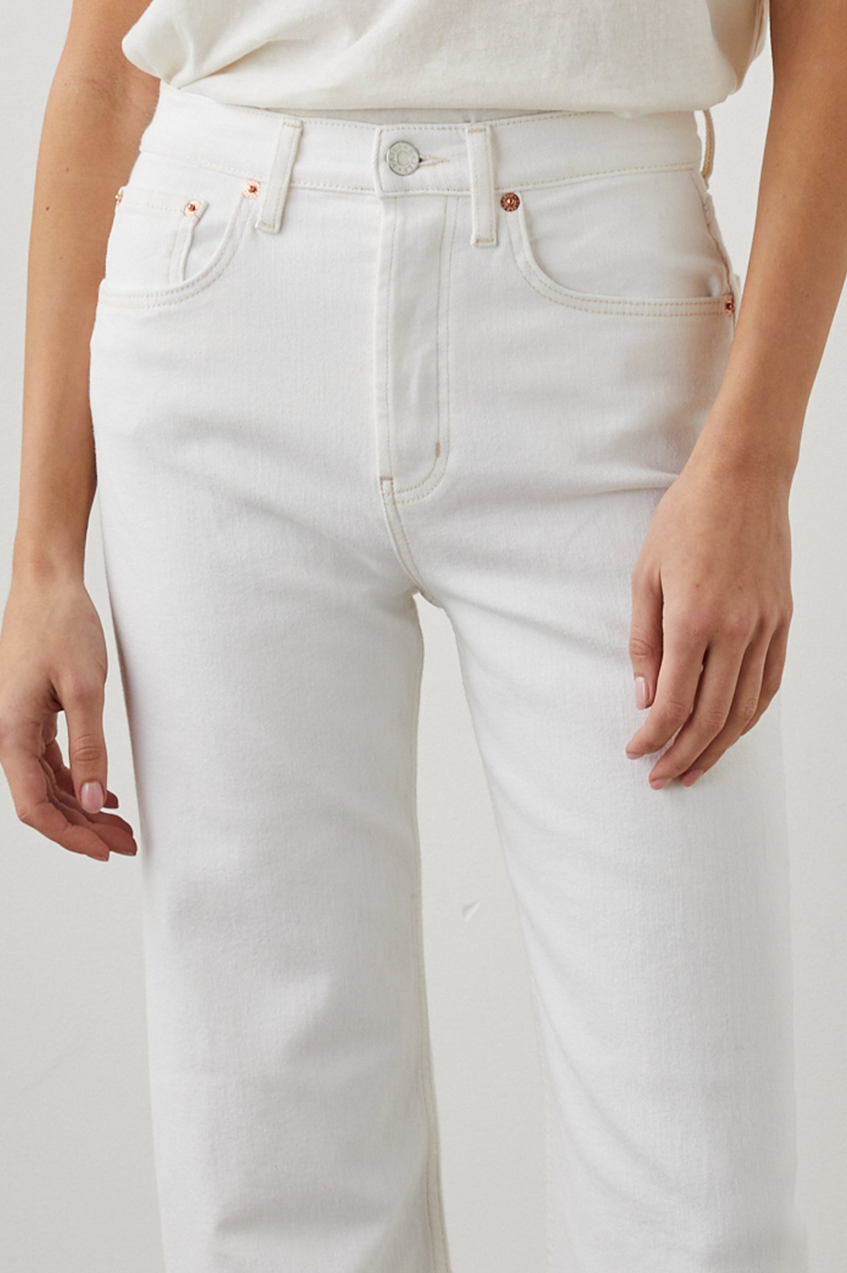 Getty Wide Leg Denim Pants with Belt Loops, Two Front Pockets and Two Back Patch Pockets in Vintage Ecru Colorway - Front View Featured on Model