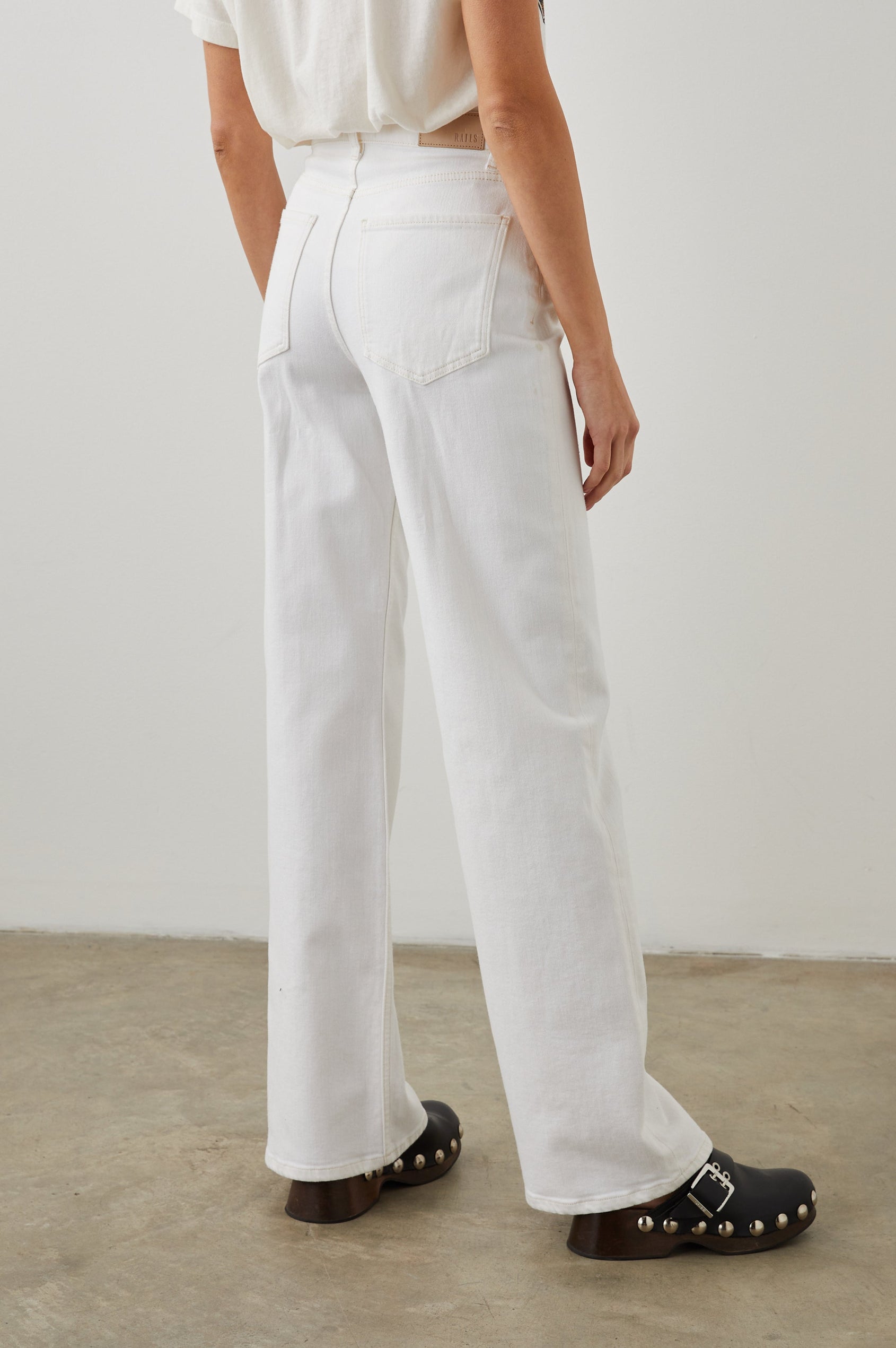 Getty Wide Leg Denim Pants with Belt Loops, Two Front Pockets and Two Back Patch Pockets in Vintage Ecru Colorway - Back View Featured on Model