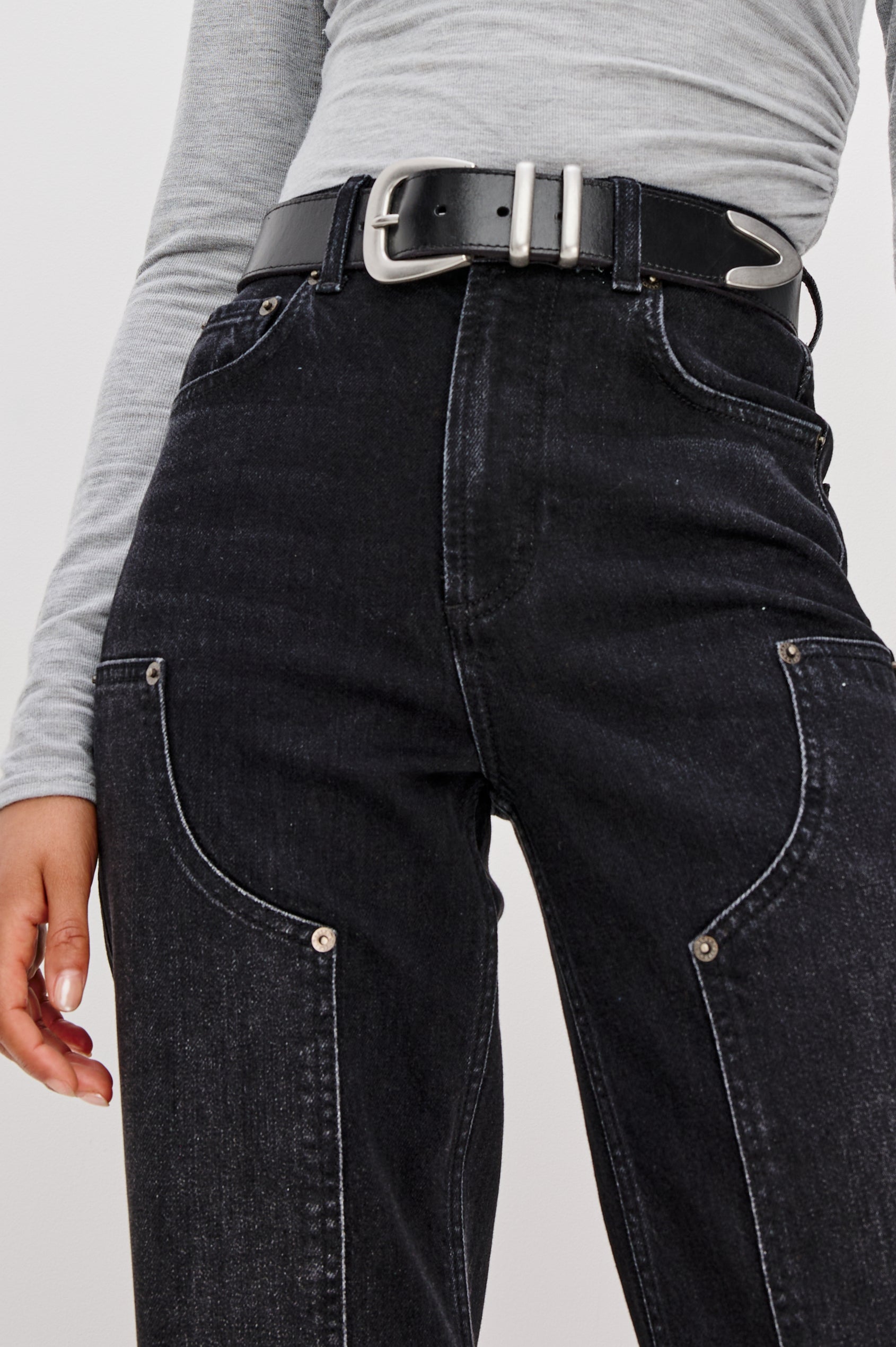 Getty Wide Leg Jean in Denim With High-Rise High-Waisted Fit, Front Button Fly, Carpenter Leg Panels, and 5-Pocket Styling in Onyx Colorway - Lower Body Front Close Up View Featured on Model