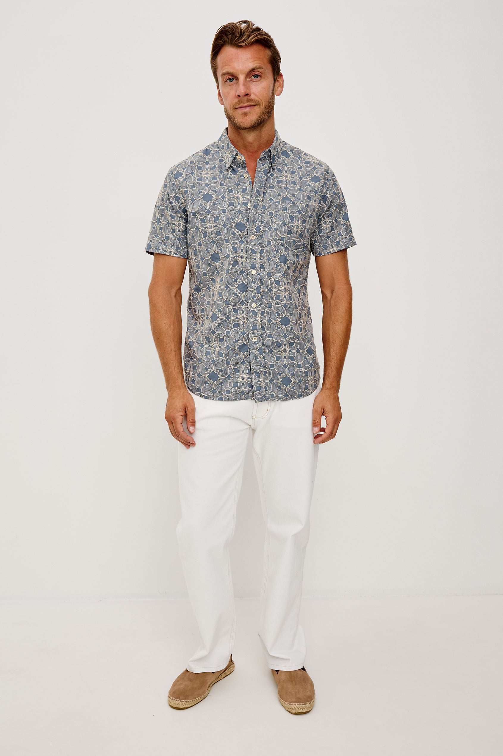 Hale Button-Up Short Sleeve Shirt in Lightweight Cotton With Contrast Jute Floral Embroidery and a Classic Fit in Daisy Steel Colorway - Full Body Front View Featured on Model