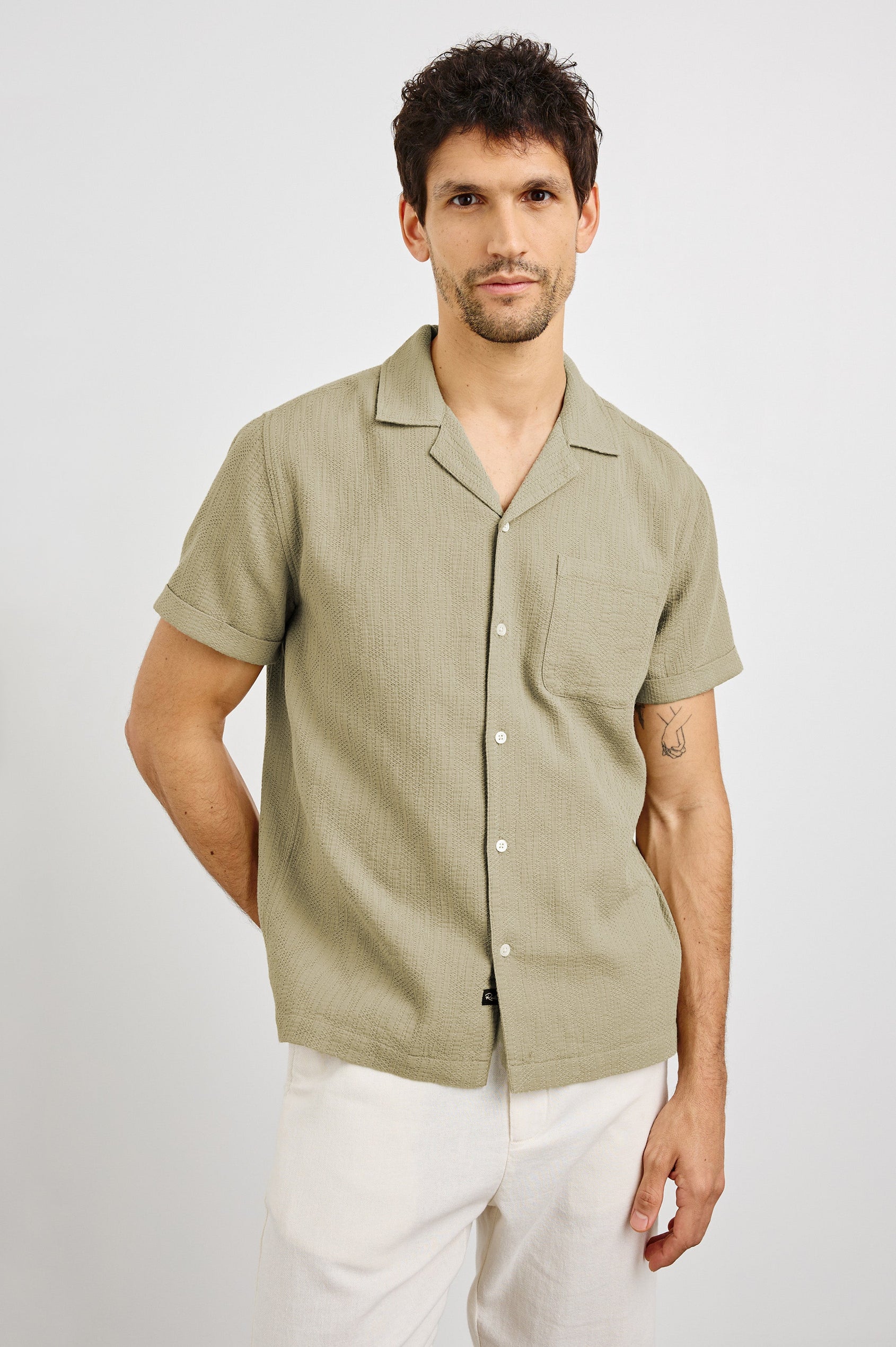Haney Collared Button Front Shirt with Short Sleeves and a Chest Pocket in Kelp Colorway. Front View Shown on Model.