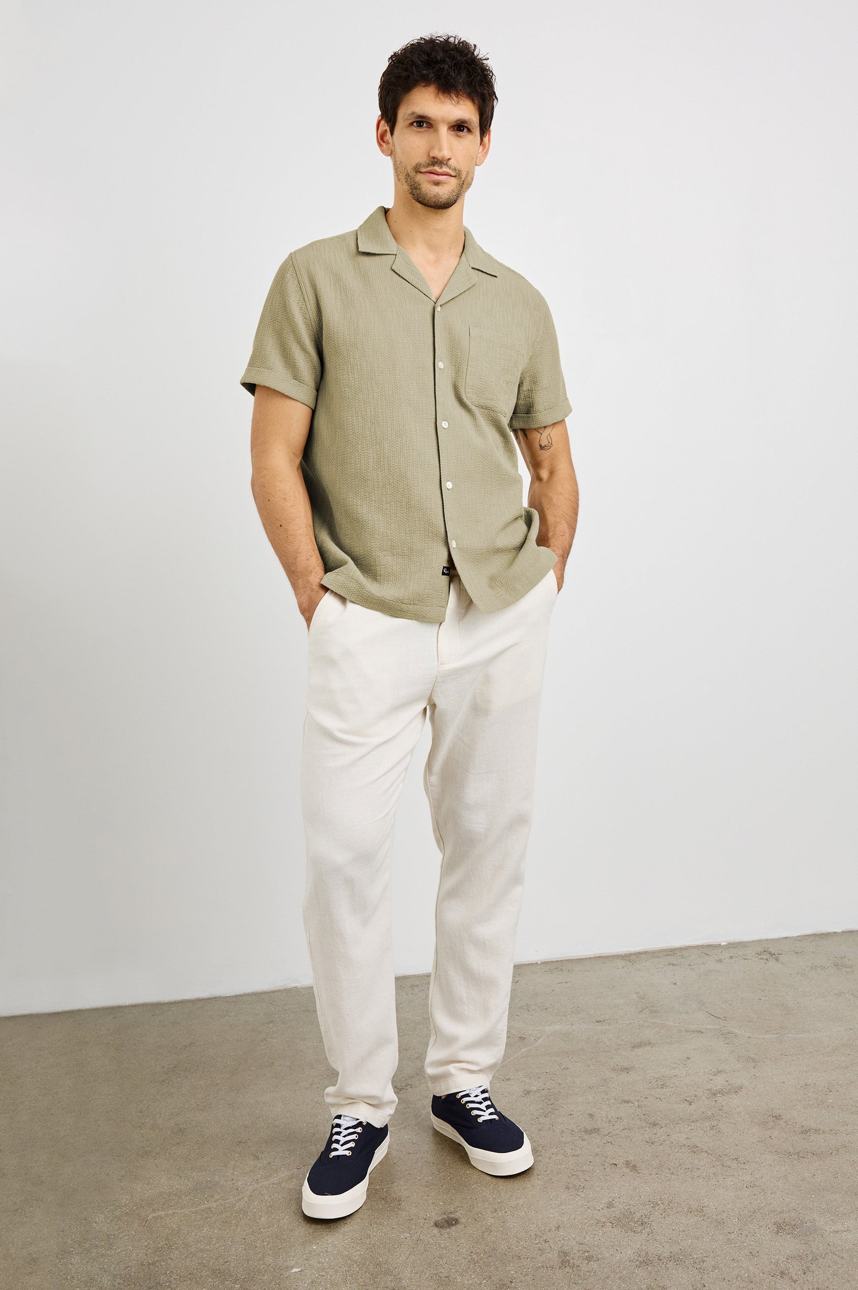 Haney Collared Button Front Shirt with Short Sleeves and a Chest Pocket in Kelp Colorway. Front View Shown on Model.