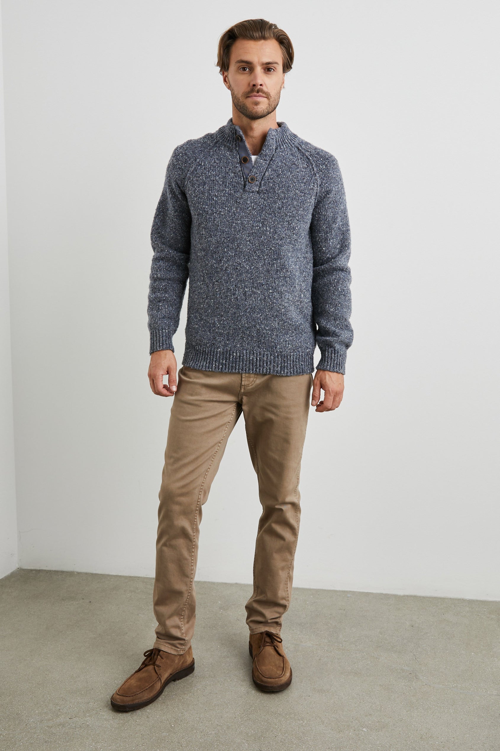 Harding Long-Sleeve Sweater with a Three-Button Half Placket, a Mock Neck and Ribbed Trim in Blue Nep Colorway, a Speckled Blue - Front Full Body View Featured on Model