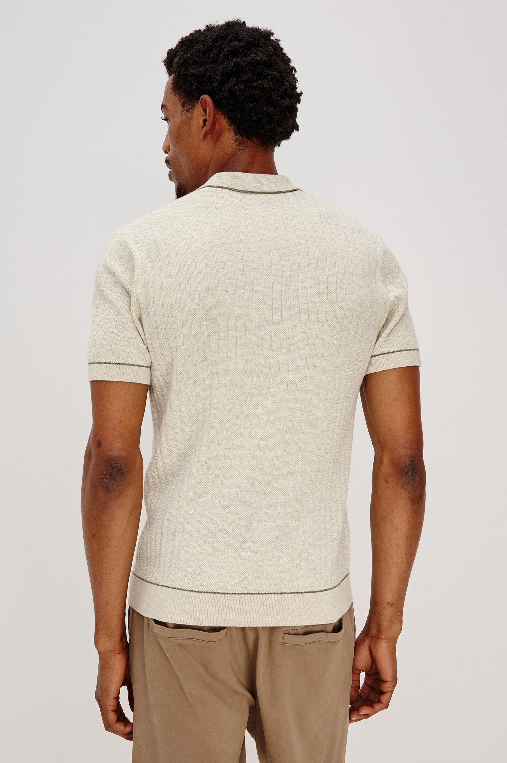 Hardy short sleeve cotton rib polo with chest pocket, two button placket and contrast stitching in Oat Heather - back view on model