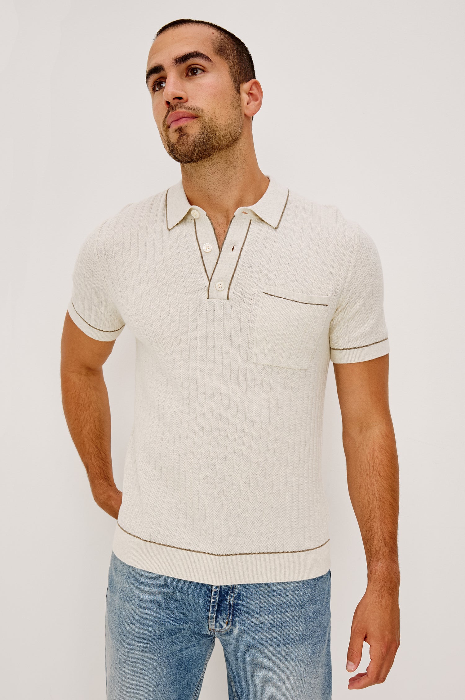 Hardy Polo Shirt in Luxe Cotton Rib Knit With Collar, Half Button Placket, Short Sleeves, and Contrast Trim in Oat Heather Colorway - Upper Body Front View Featured on Model