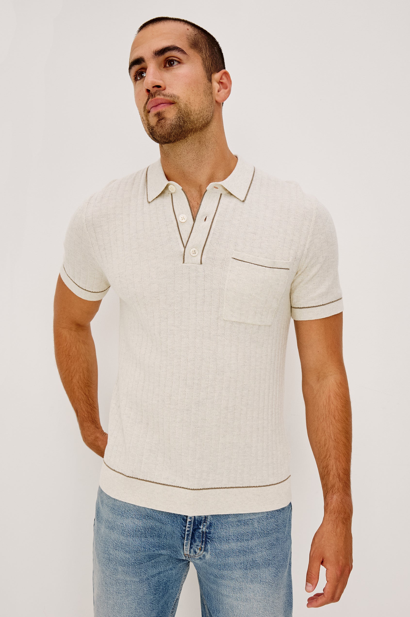Hardy Polo Shirt in Luxe Cotton Rib Knit With Collar, Half Button Placket, Short Sleeves, and Contrast Trim in Oat Heather Colorway - Upper Body Front View Featured on Model