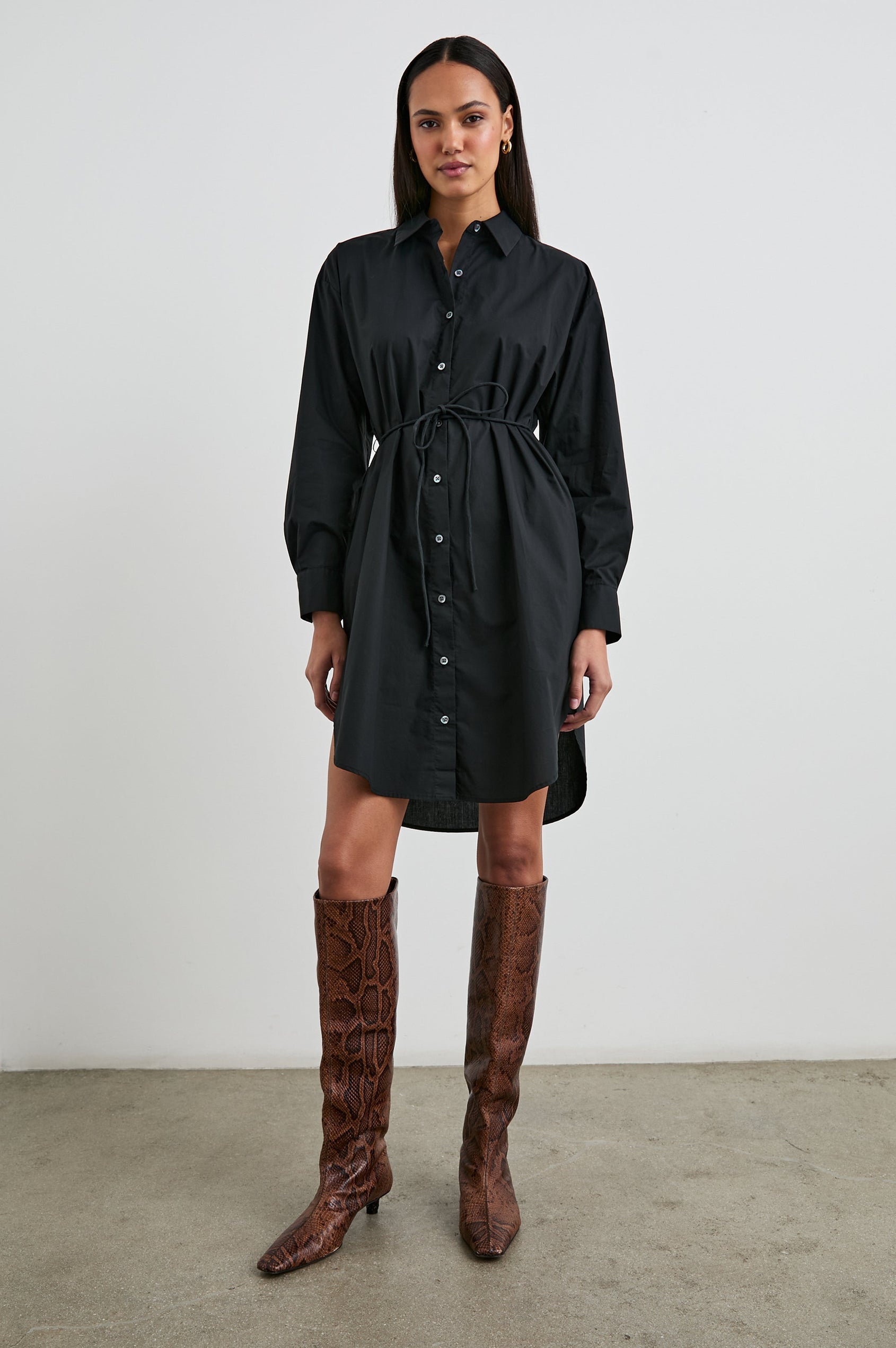 Harmony Long-Sleeve Mini Dress with Buttons Down the Front, Buttoned Cuffs, a Collar, Side Slits and a Tie at the Waist in Black Colorway - Front Full Body View Featured on Model