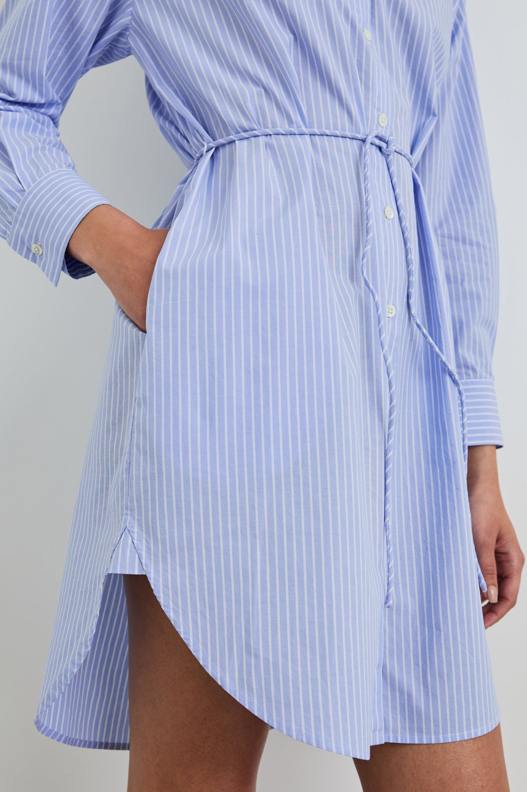 Harmony Long-Sleeve Mini Dress with Buttons Down the Front, Buttoned Cuffs, a Collar, Side Slits and a Tie at the Waist in Oxford White Stripe Colorway, Vertical Blue and White Stripes - Front View Featured on Model