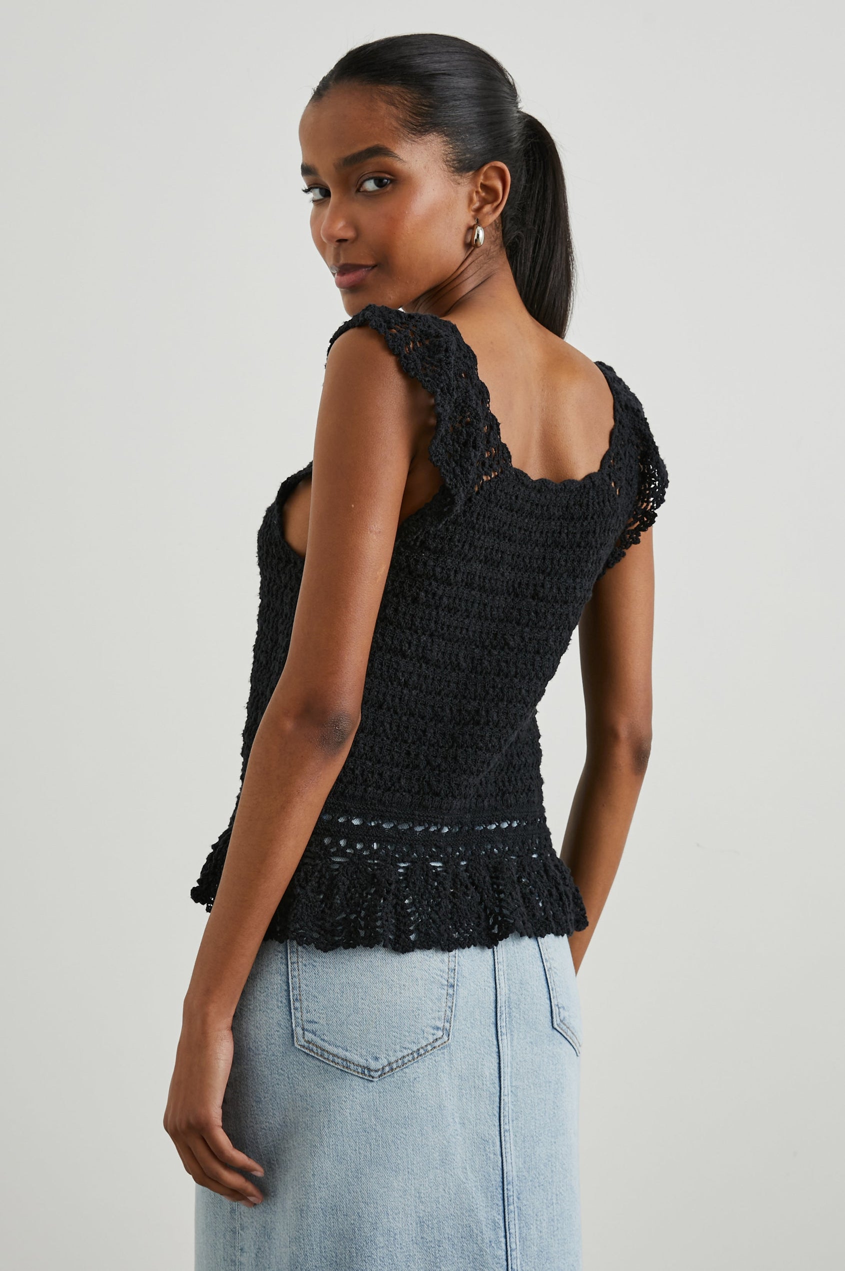 Hattie Crocheted Tank Top with Wide Shoulder Straps, a Scoop Neck and a Crocheted Design at the Hem in Black Colorway - Back View Featured on Model 