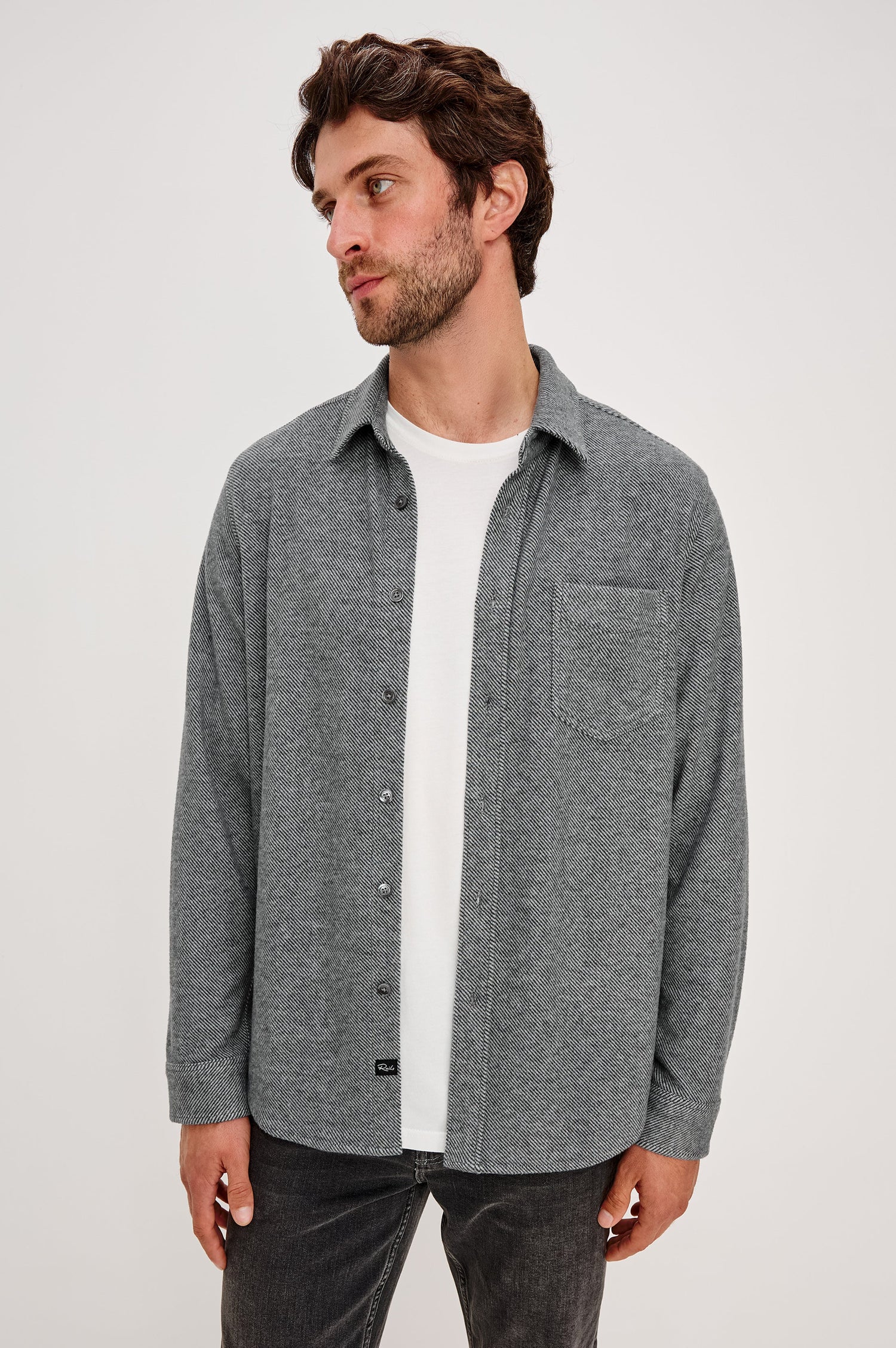 Hawke Long Sleeve Button Front Shirt with a Chest Pocket in Charcoal Twill Colorway. Front View Featured on Model.