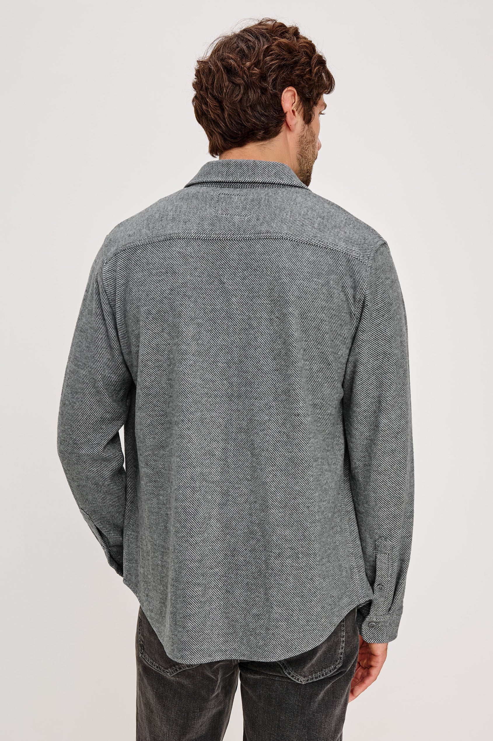 Hawke Long Sleeve Button Front Shirt with a Chest Pocket in Charcoal Twill Colorway. Back View Featured on Model.