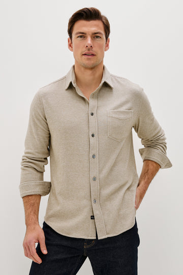 Hawke Long Sleeve Button Front Shirt with a Chest Pocket in Taupe Twill Colorway. Front View Featured on Model.